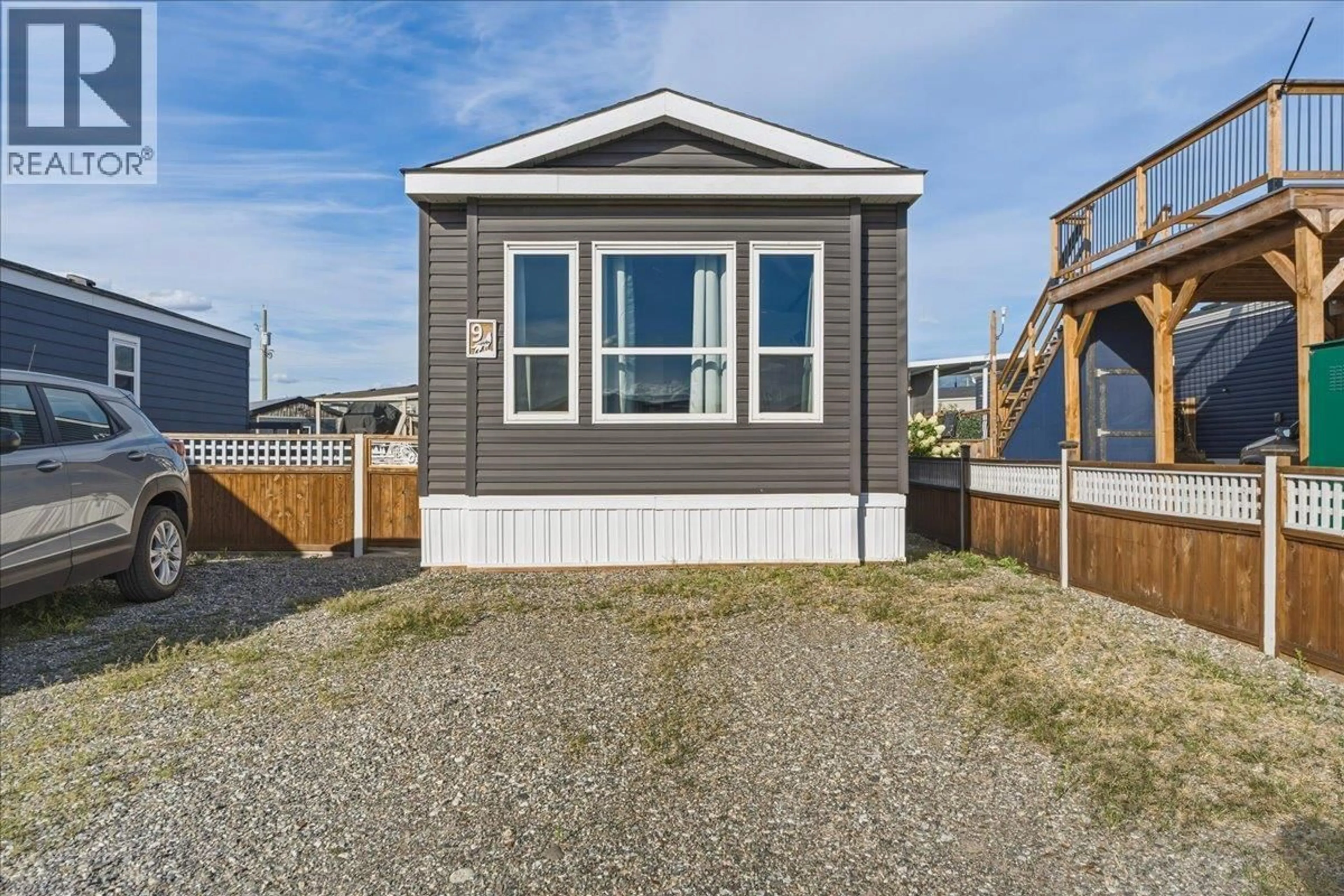 Home with vinyl exterior material, street for 9 - 65 ANTOINE ROAD, Vernon British Columbia V1H2A3