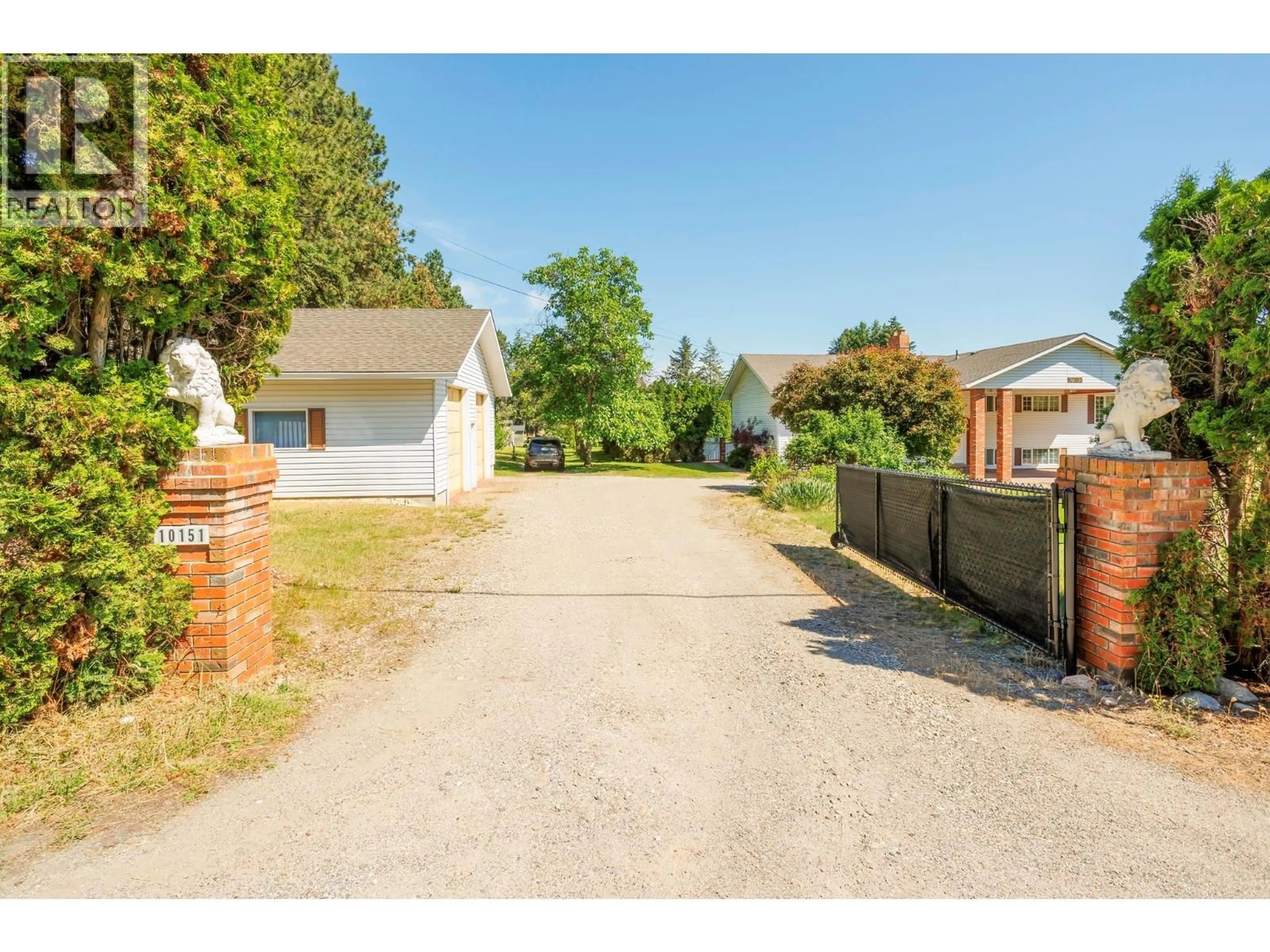 A pic from outside/outdoor area/front of a property/back of a property/a pic from drone, street for 10151 CHASE ROAD, Lake Country British Columbia V4V1P3