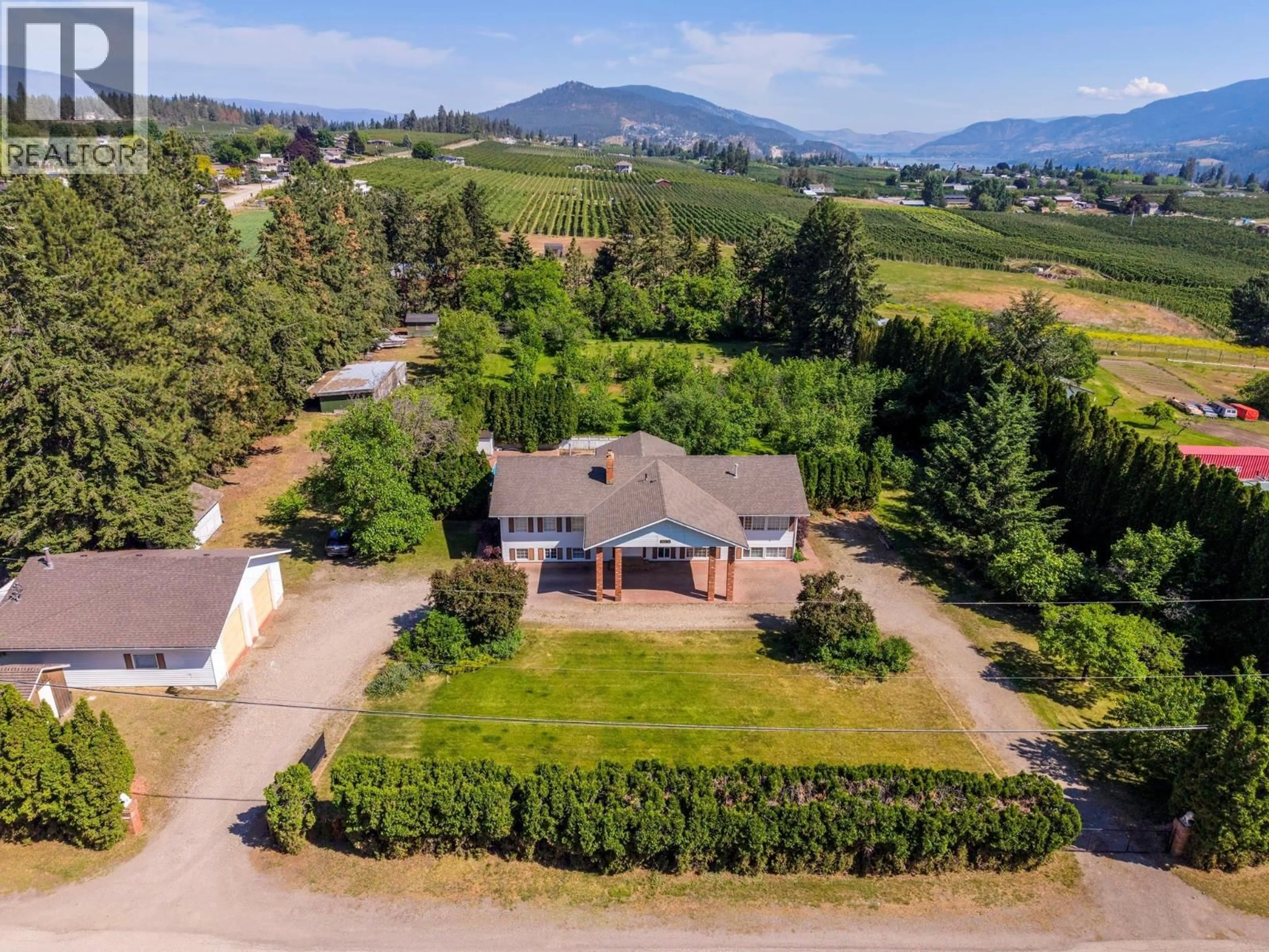 A pic from outside/outdoor area/front of a property/back of a property/a pic from drone, mountain view for 10151 CHASE ROAD, Lake Country British Columbia V4V1P3