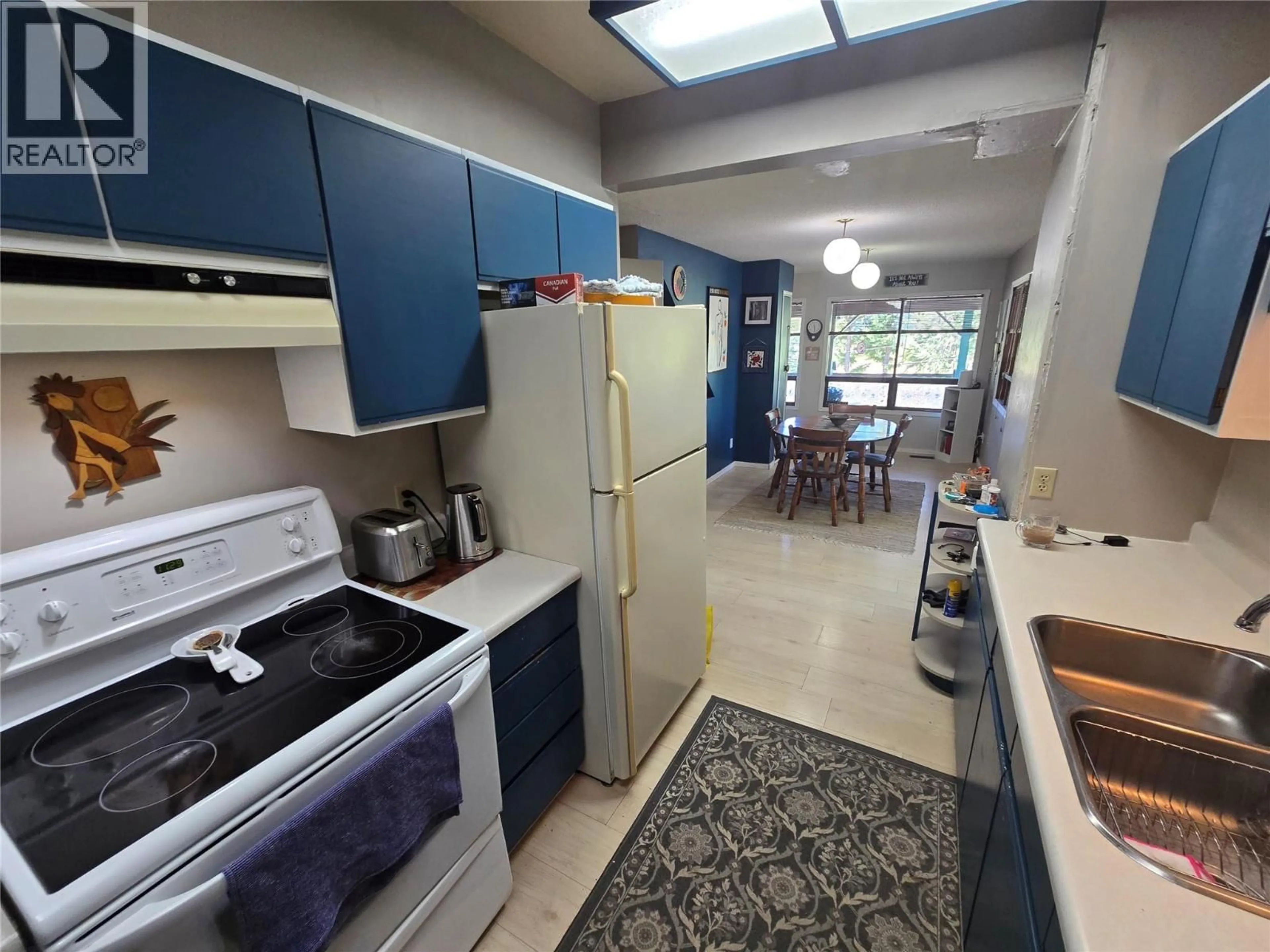 Standard kitchen, ceramic/tile floor for 1037 RAFT RIVER ROAD, Clearwater British Columbia V0E1N1