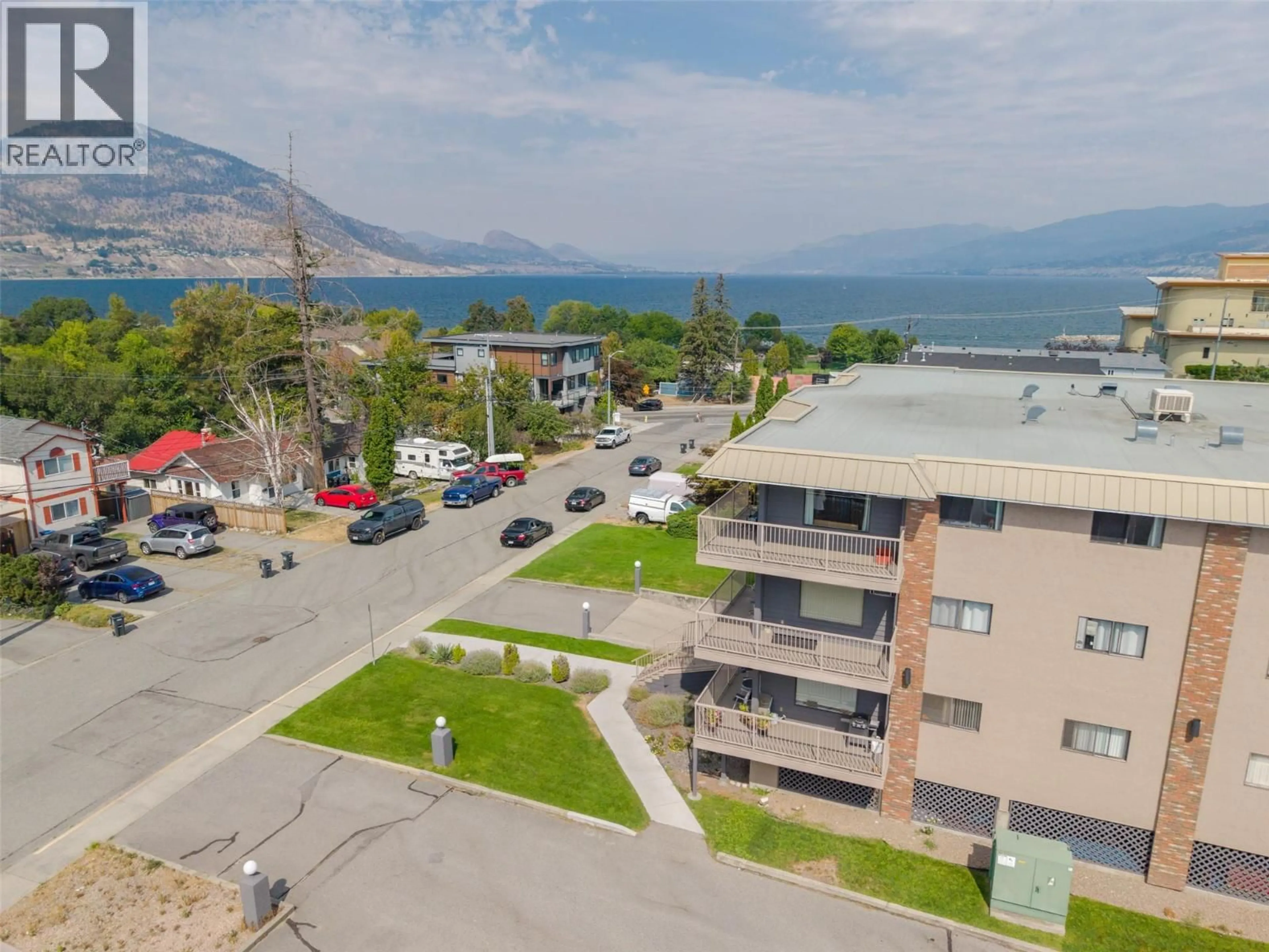 A pic from outside/outdoor area/front of a property/back of a property/a pic from drone, water/lake/river/ocean view for 304 - 84 VAN HORNE STREET, Penticton British Columbia V2A4J8