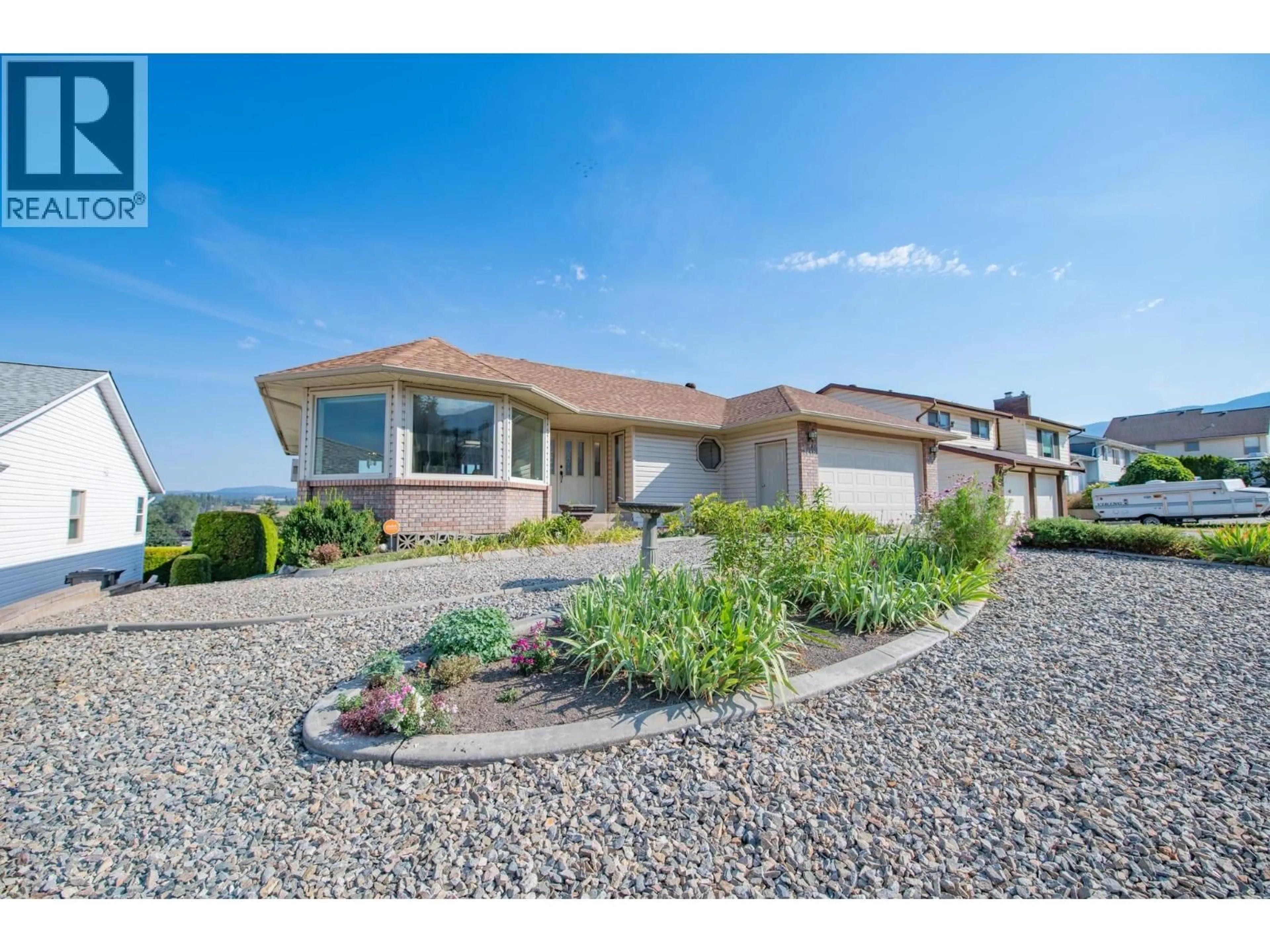 Home with vinyl exterior material, mountain view for 2650 CATHERINE CRESCENT, Armstrong British Columbia V4Y0B4