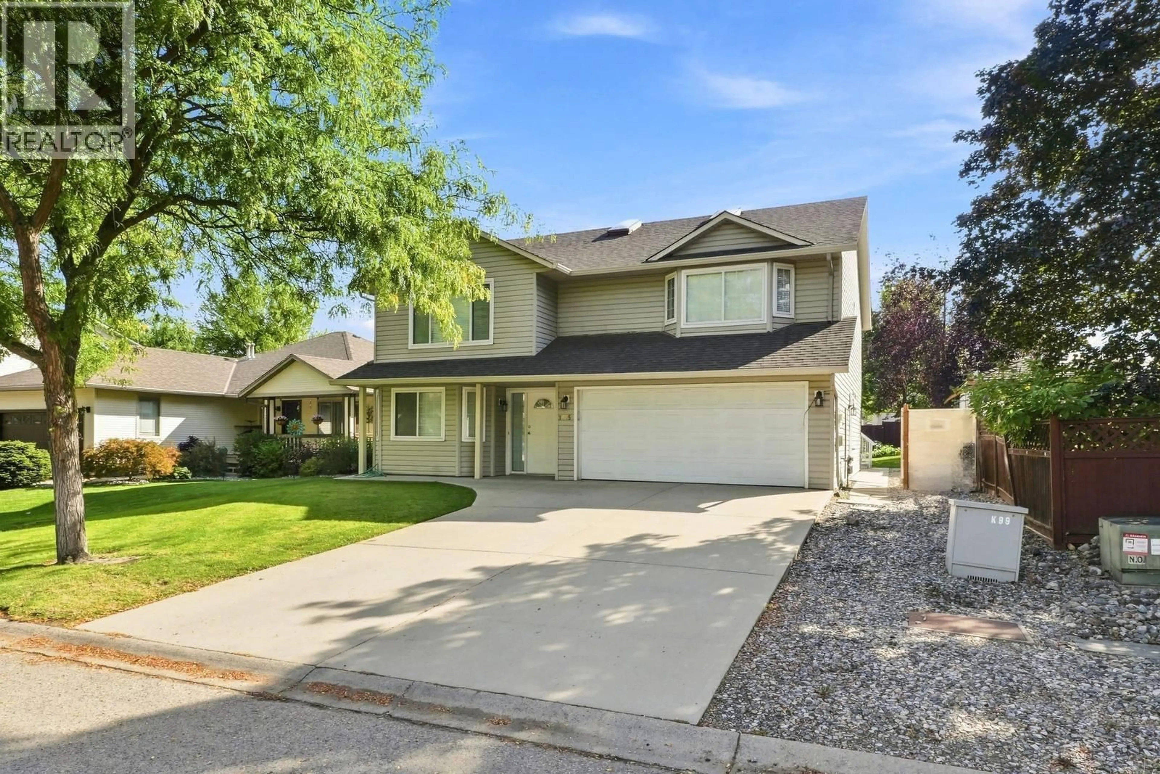 Home with vinyl exterior material, street for 1325 FRIESEN ROAD, Kelowna British Columbia V1X7P3