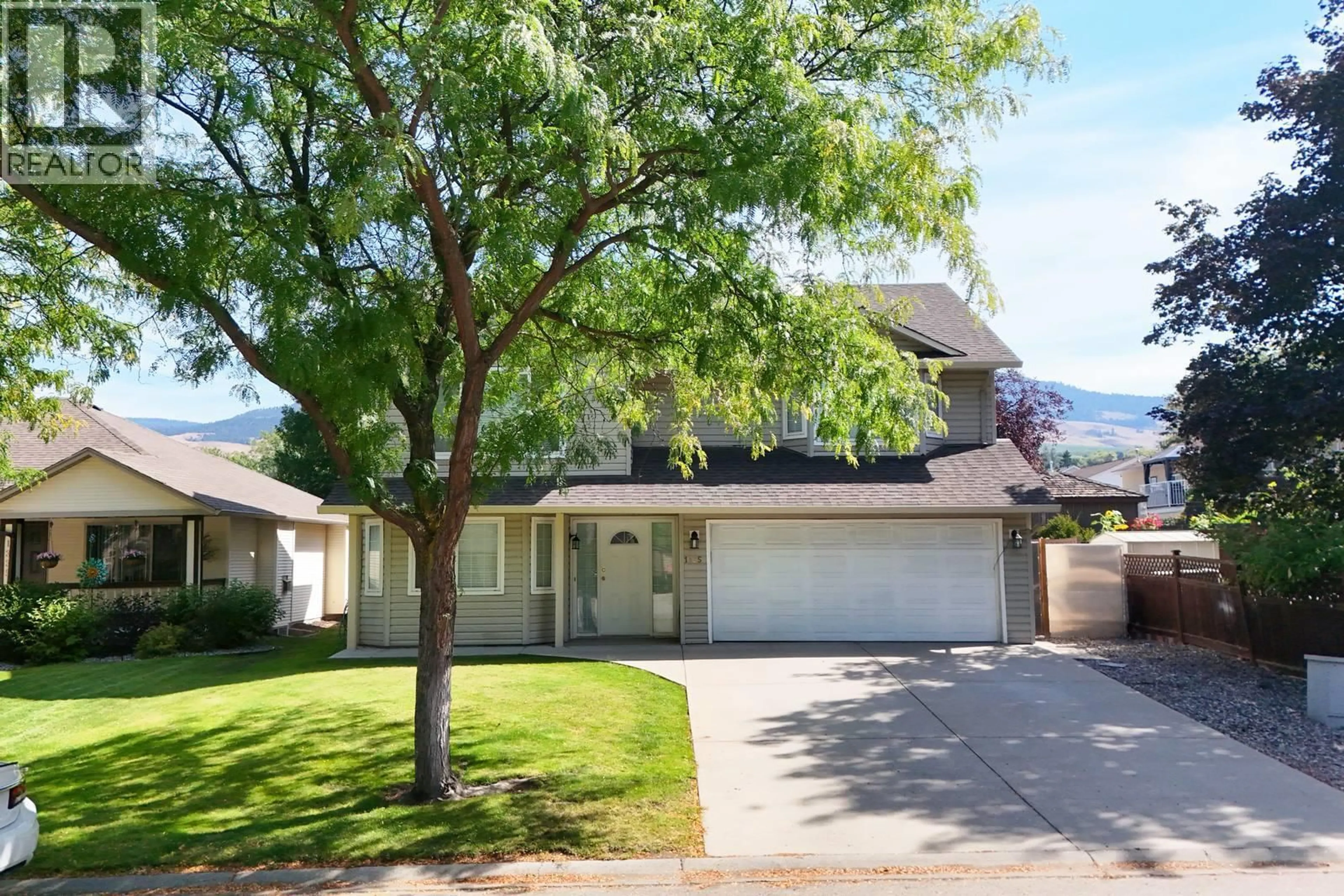 Home with vinyl exterior material, street for 1325 FRIESEN ROAD, Kelowna British Columbia V1X7P3