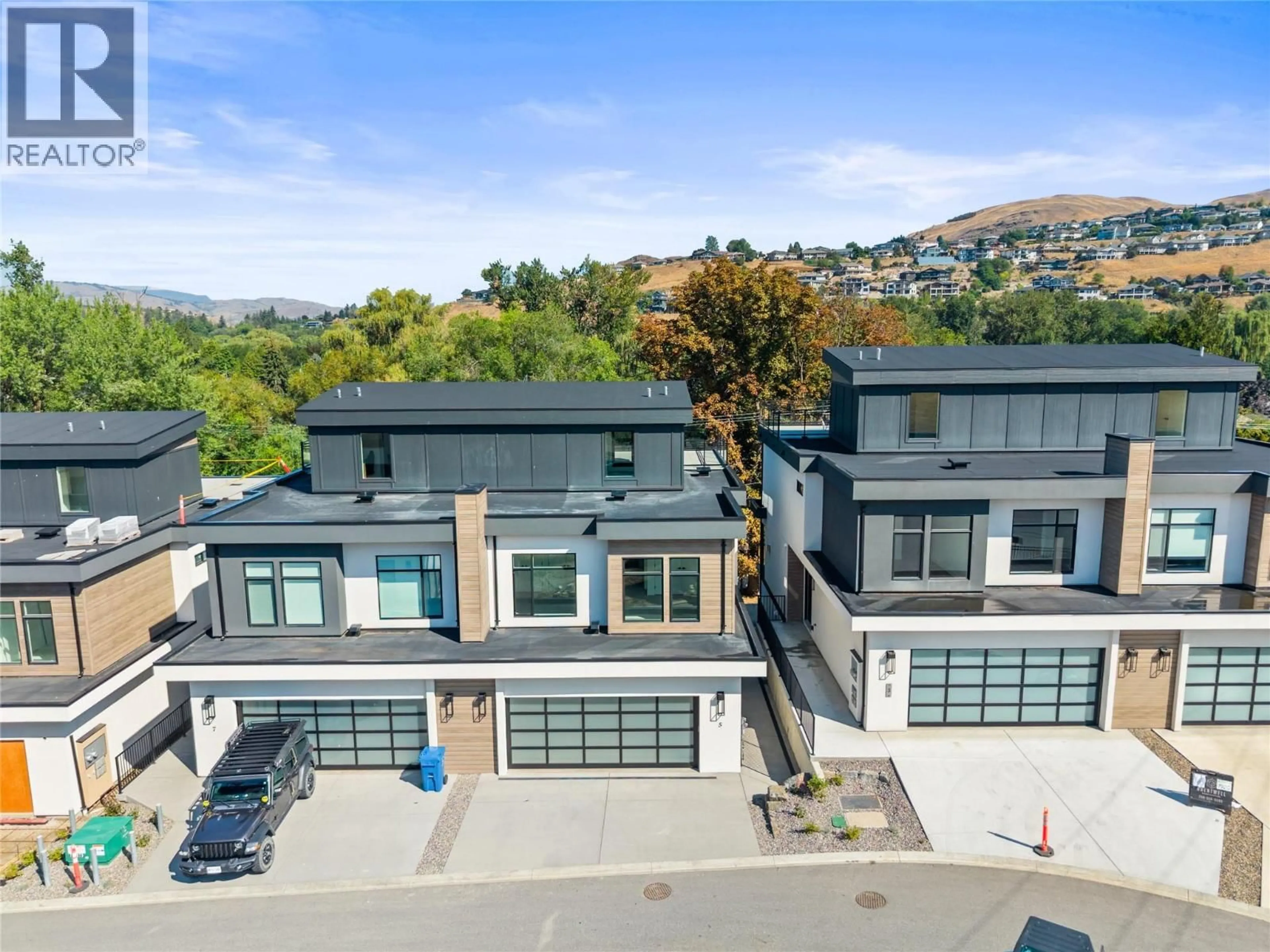 A pic from outside/outdoor area/front of a property/back of a property/a pic from drone, mountain view for 5 - 7920 KIDSTON ROAD, Coldstream British Columbia V1B0B4