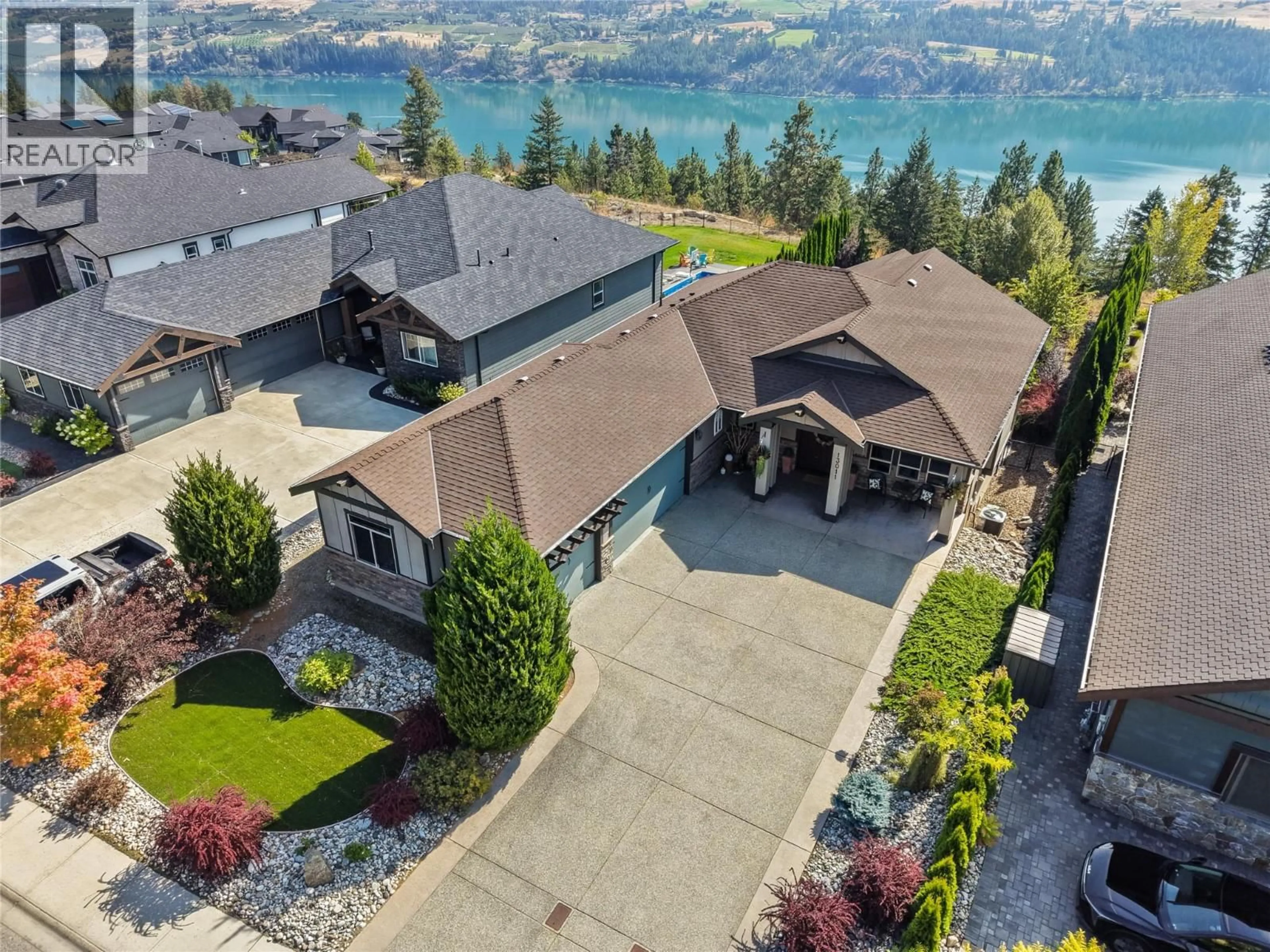 A pic from outside/outdoor area/front of a property/back of a property/a pic from drone, water/lake/river/ocean view for 13011 EAST RIDGE DRIVE, Lake Country British Columbia V4V2P9