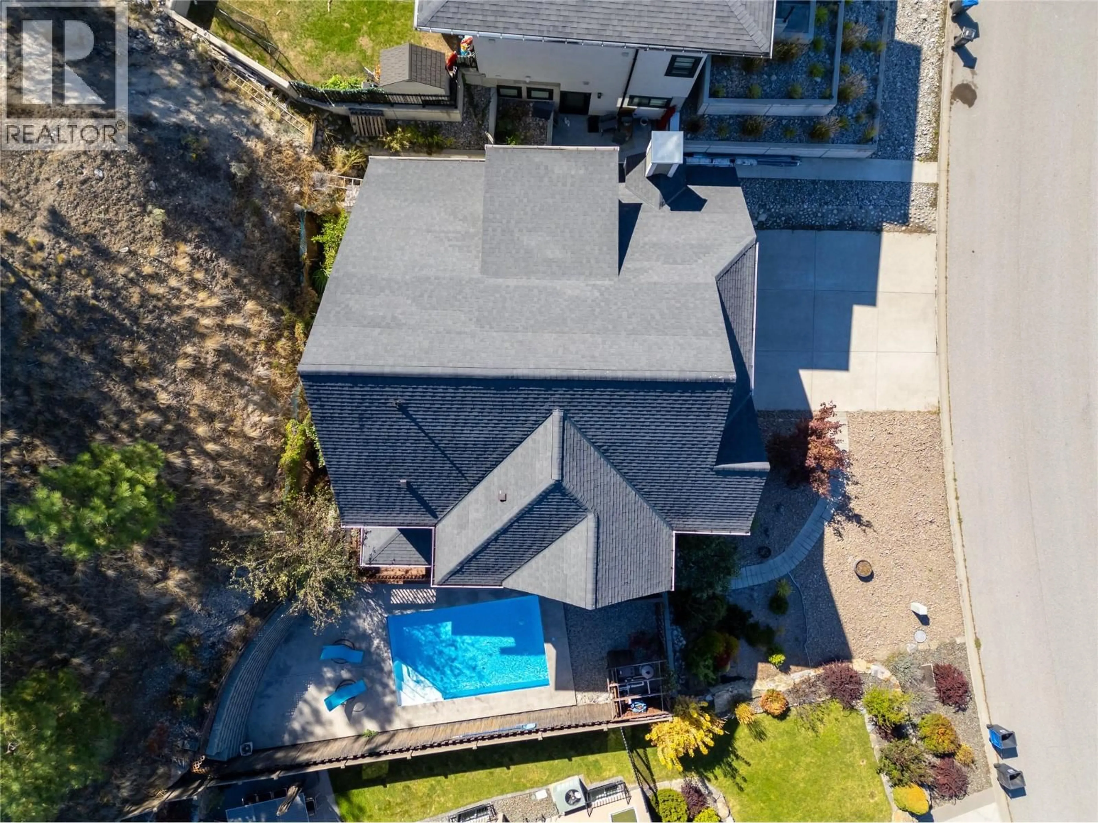A pic from outside/outdoor area/front of a property/back of a property/a pic from drone, street for 2478 EVERGREEN DRIVE, Penticton British Columbia V2A9C7