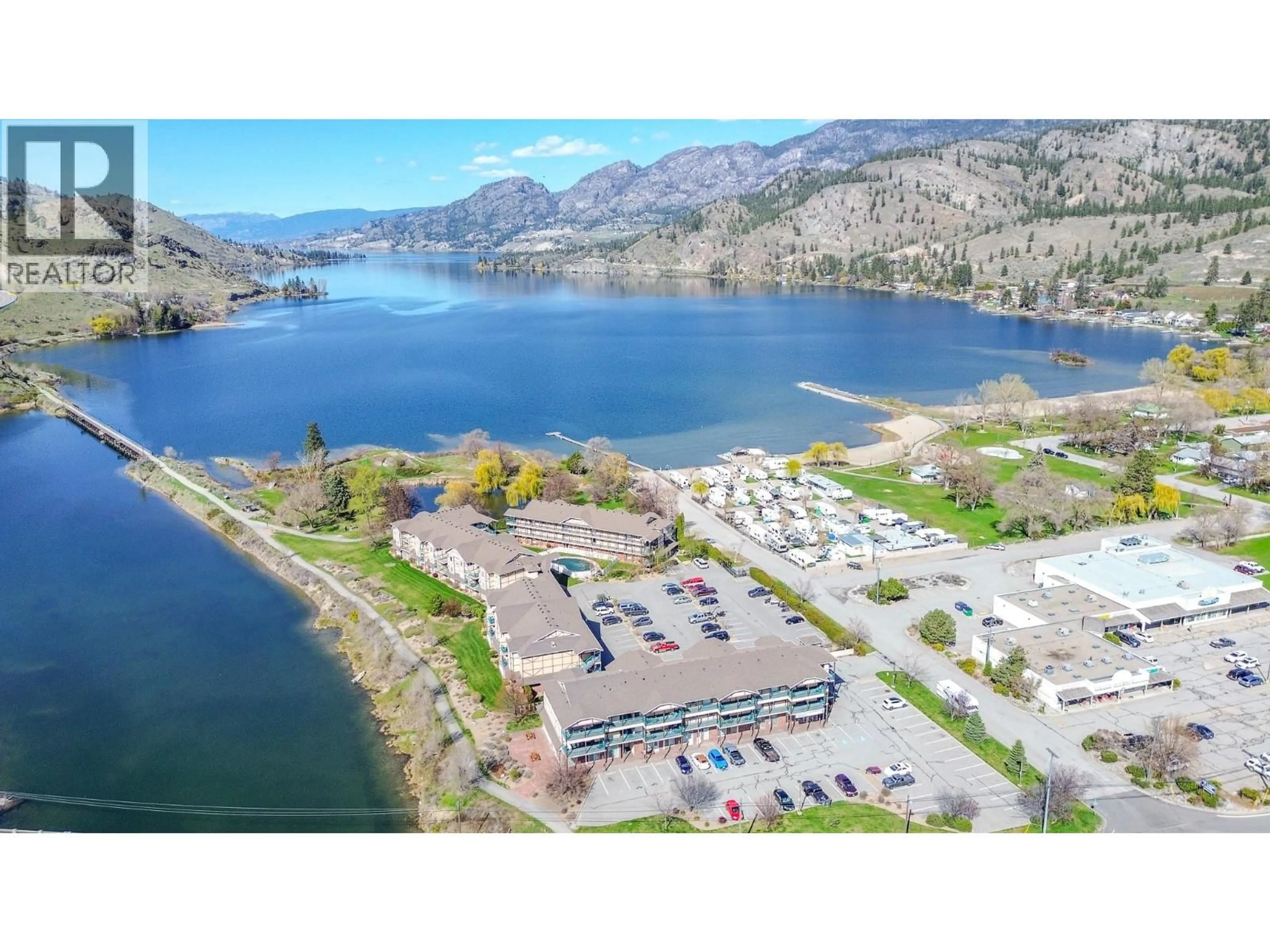A pic from outside/outdoor area/front of a property/back of a property/a pic from drone, water/lake/river/ocean view for 203 - 850 RAILWAY LANE, Okanagan Falls British Columbia V0H1R4