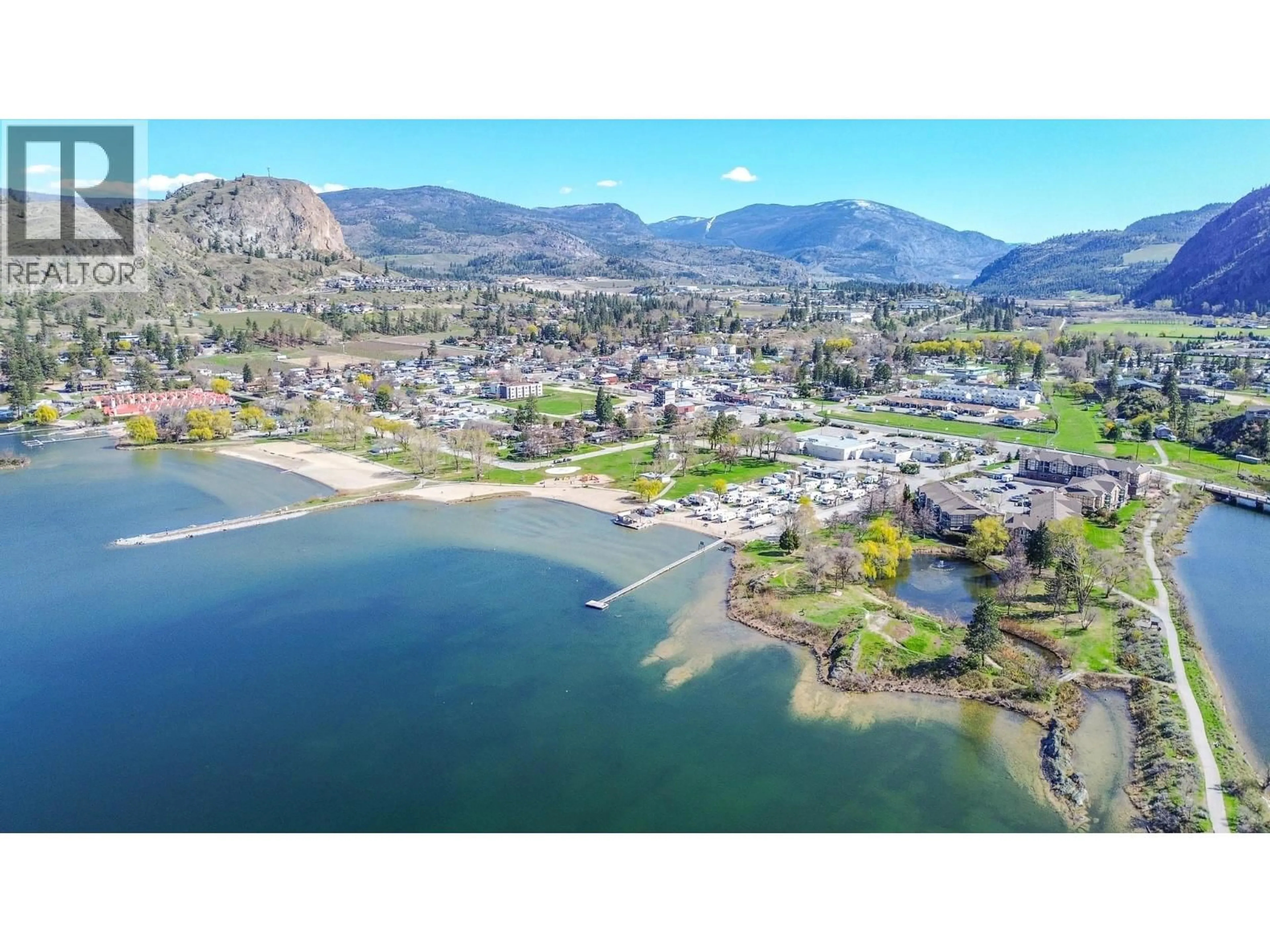 A pic from outside/outdoor area/front of a property/back of a property/a pic from drone, water/lake/river/ocean view for 203 - 850 RAILWAY LANE, Okanagan Falls British Columbia V0H1R4