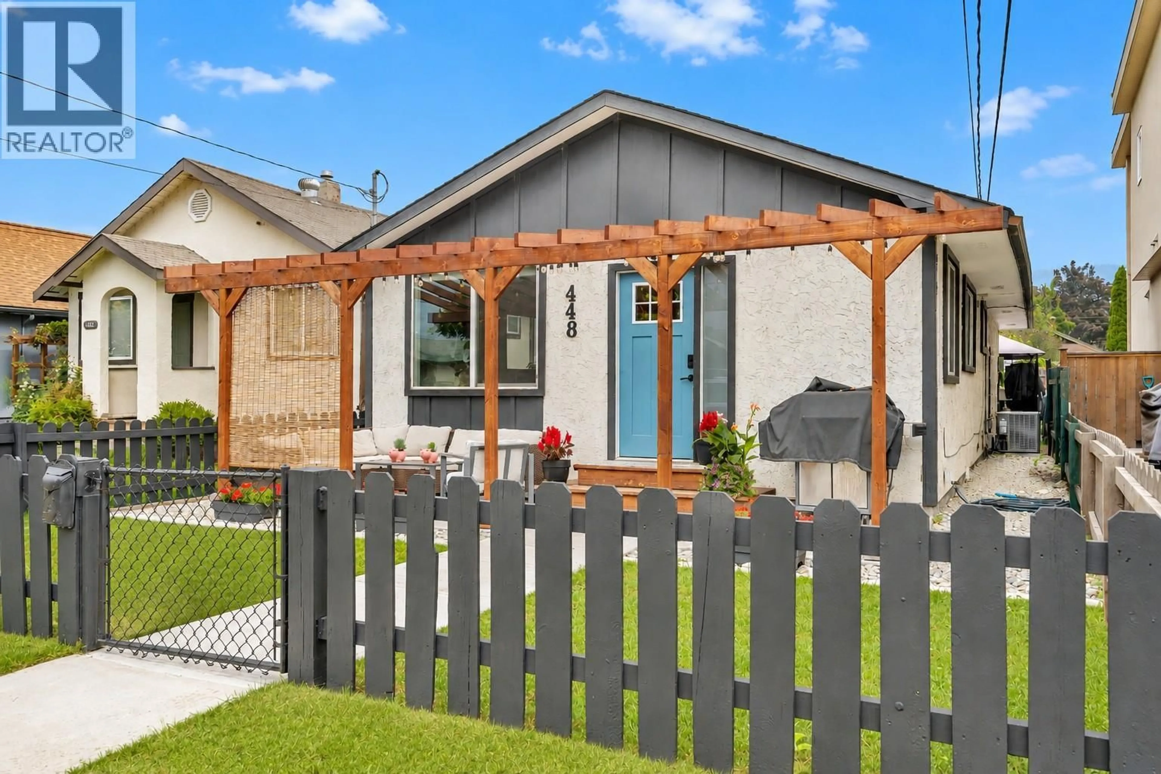Home with vinyl exterior material, street for 448 CARIBOU STREET, Penticton British Columbia V2A5W6