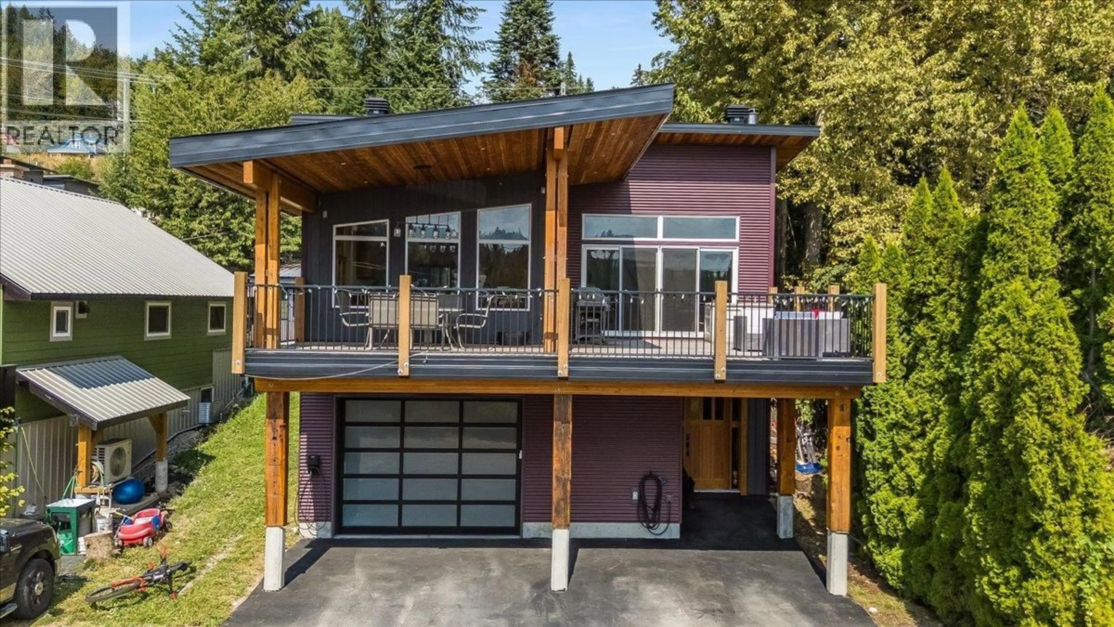 Home with vinyl exterior material, street for 1715A LEROI AVENUE, Rossland British Columbia V0G1Y0