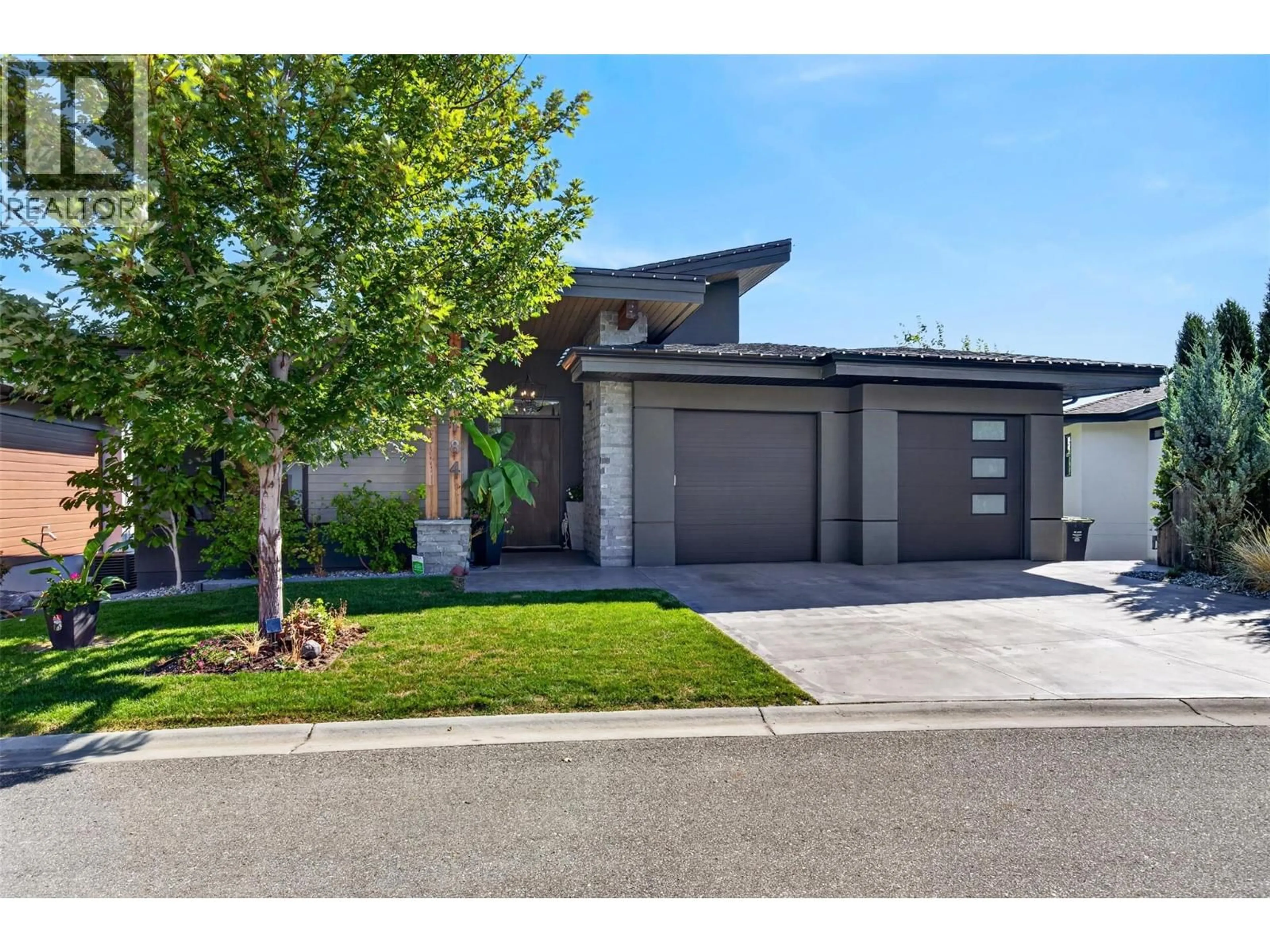 Home with brick exterior material, street for 184 SUMMER WOOD DRIVE, Kelowna British Columbia V1V0C9
