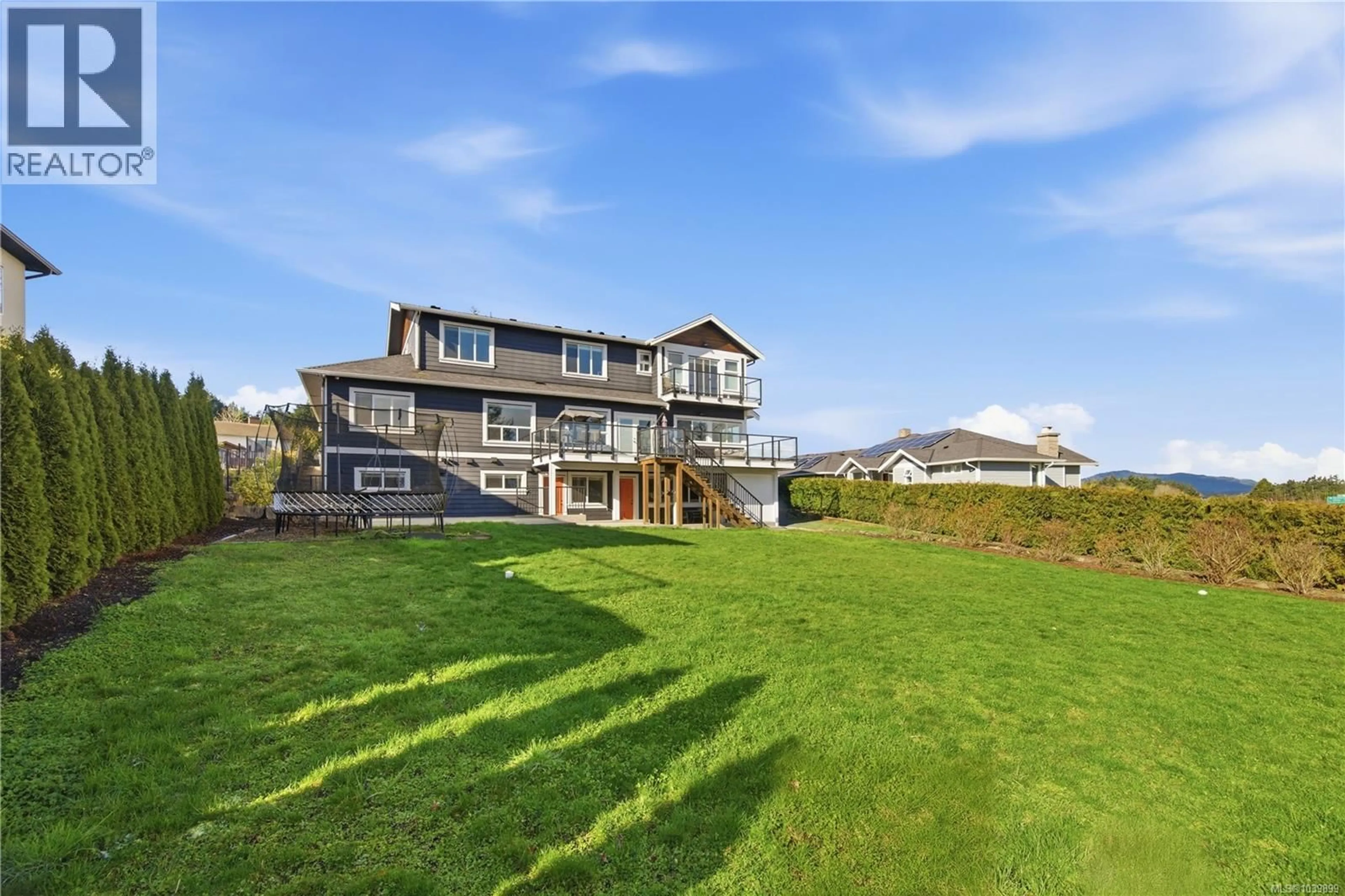 A pic from outside/outdoor area/front of a property/back of a property/a pic from drone, water/lake/river/ocean view for 8711 BOURNE TERRACE, North Saanich British Columbia V8L1L8