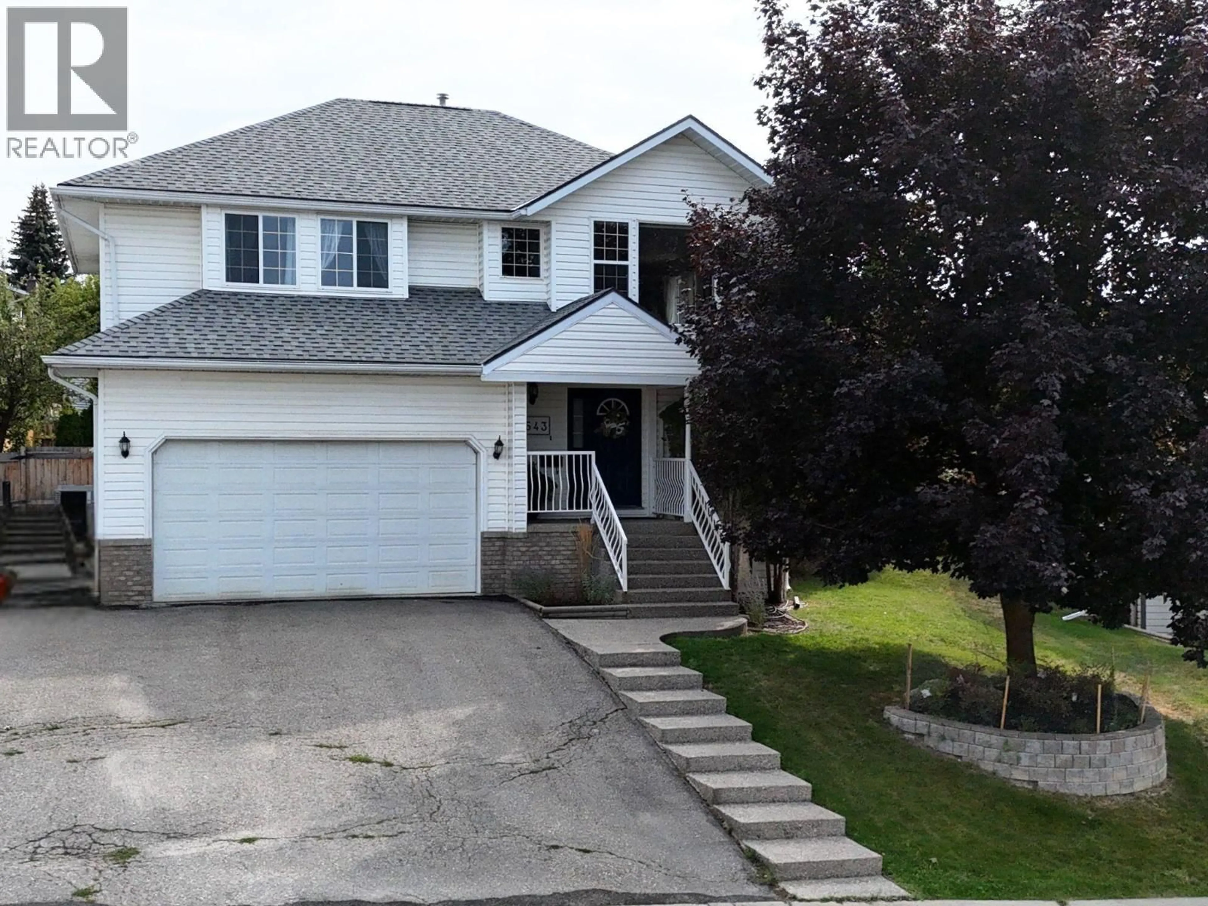 Home with vinyl exterior material, street for 1643 STAPLE CRESCENT, Cranbrook British Columbia V1C6J1