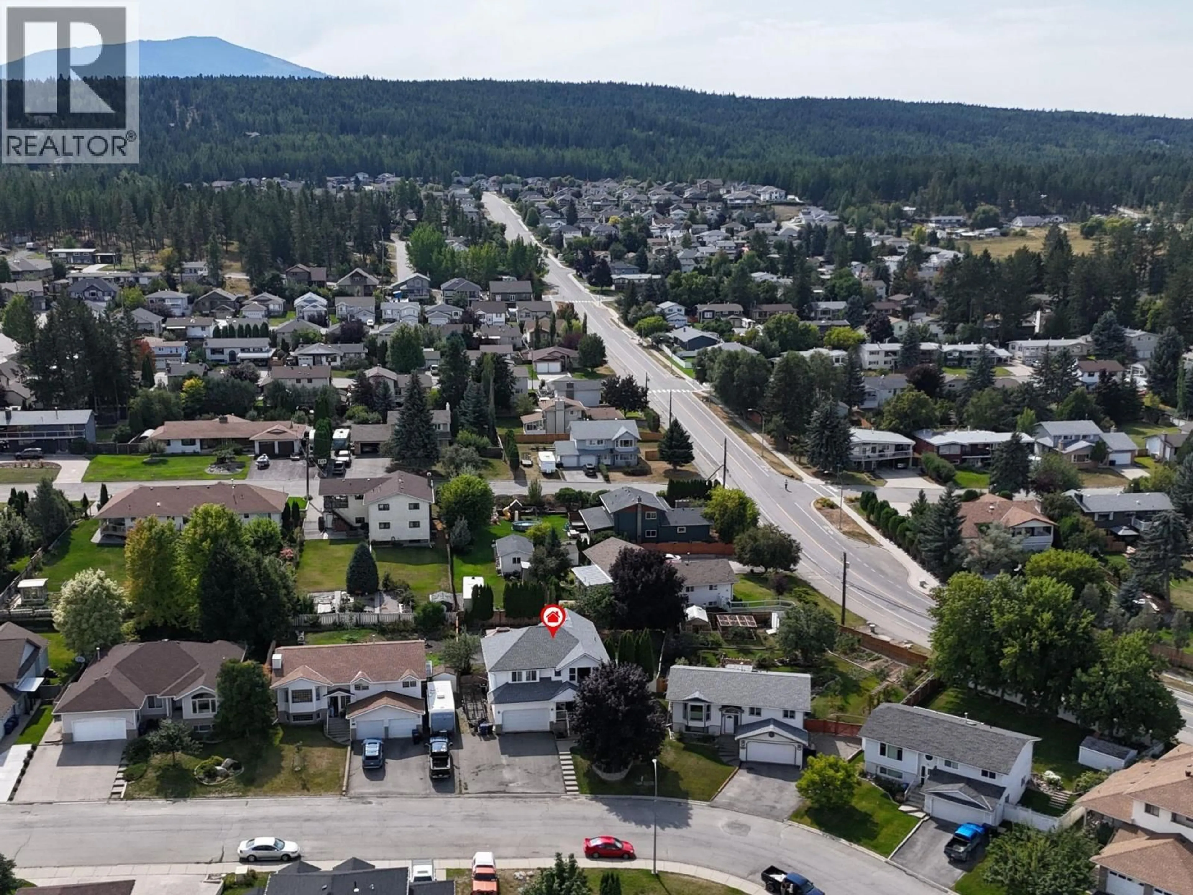 A pic from outside/outdoor area/front of a property/back of a property/a pic from drone, mountain view for 1643 STAPLE CRESCENT, Cranbrook British Columbia V1C6J1