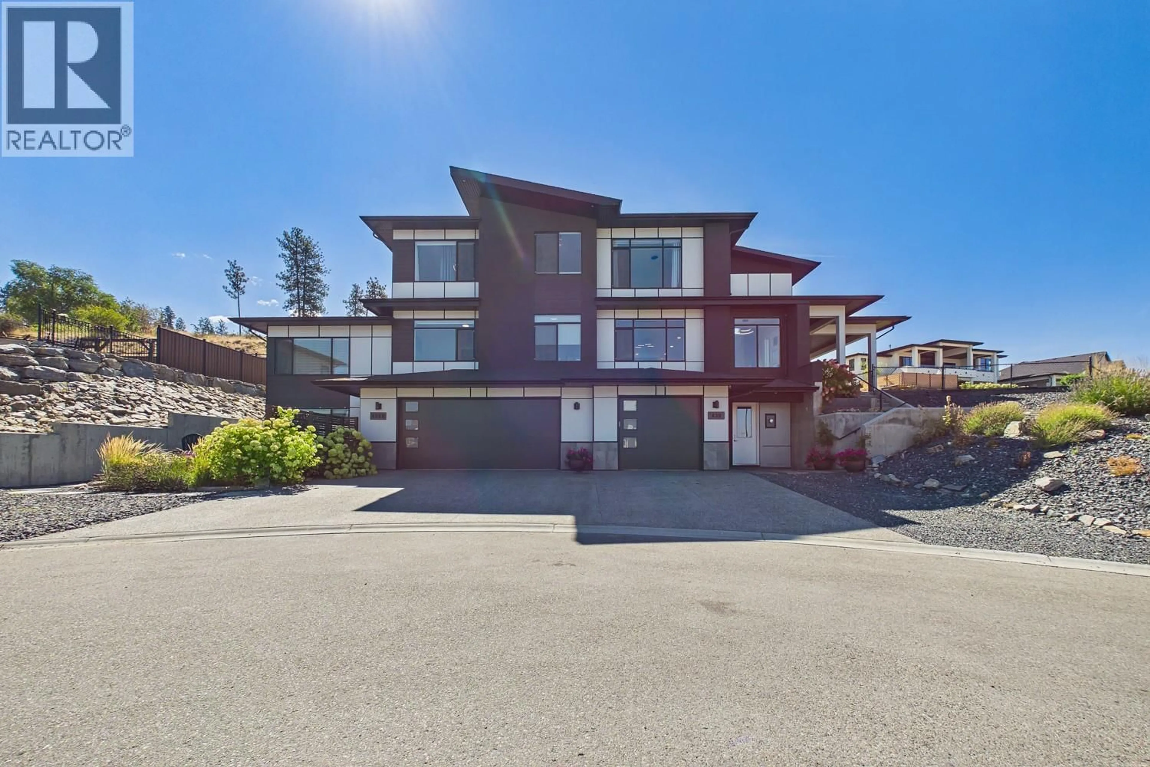 A pic from outside/outdoor area/front of a property/back of a property/a pic from drone, street for 439 REDTAIL COURT, Kelowna British Columbia V1W0B1