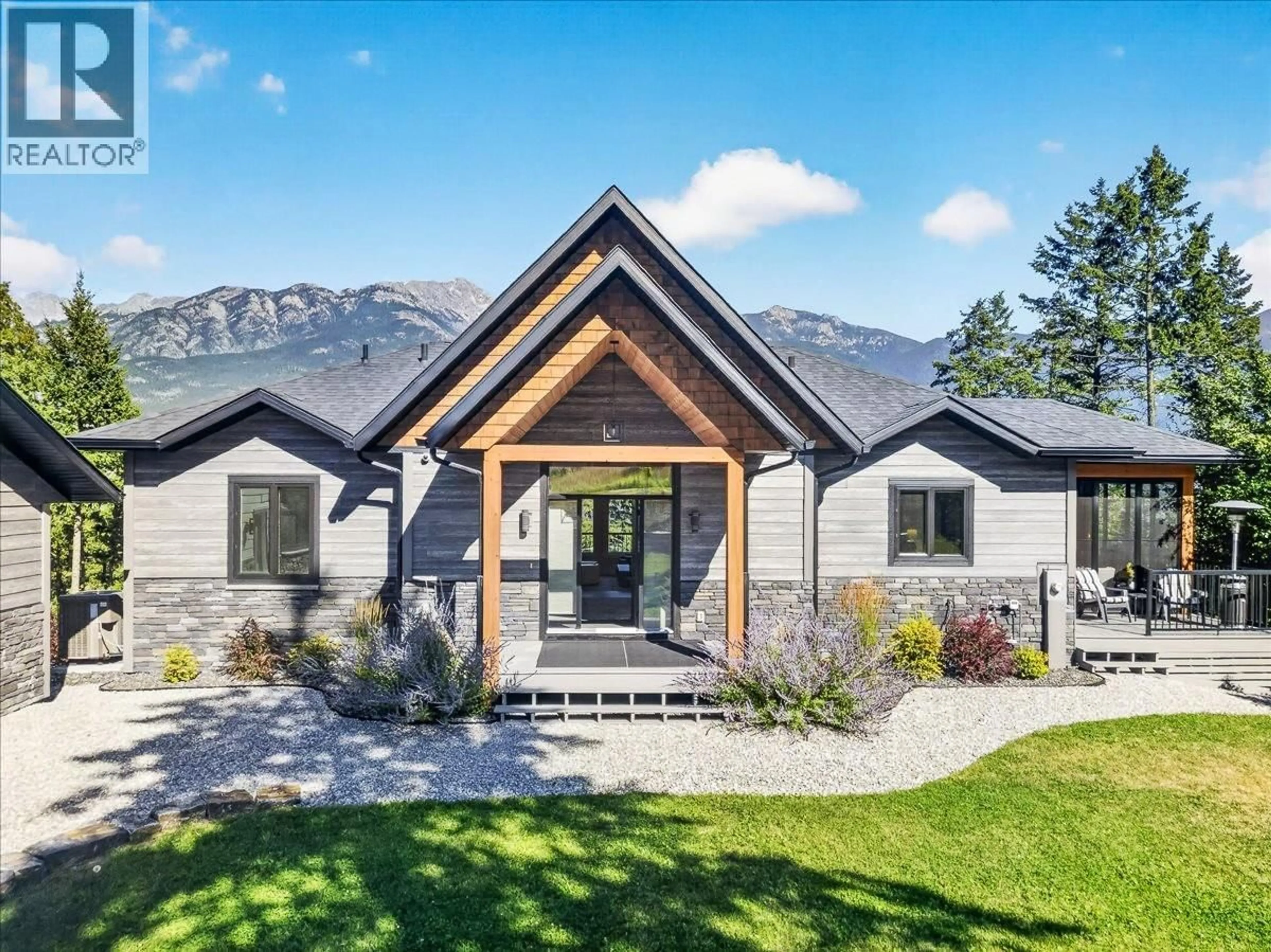 Home with brick exterior material, mountain view for 6021 ROSE TERRACE, Fairmont Hot Springs British Columbia V0B1L2