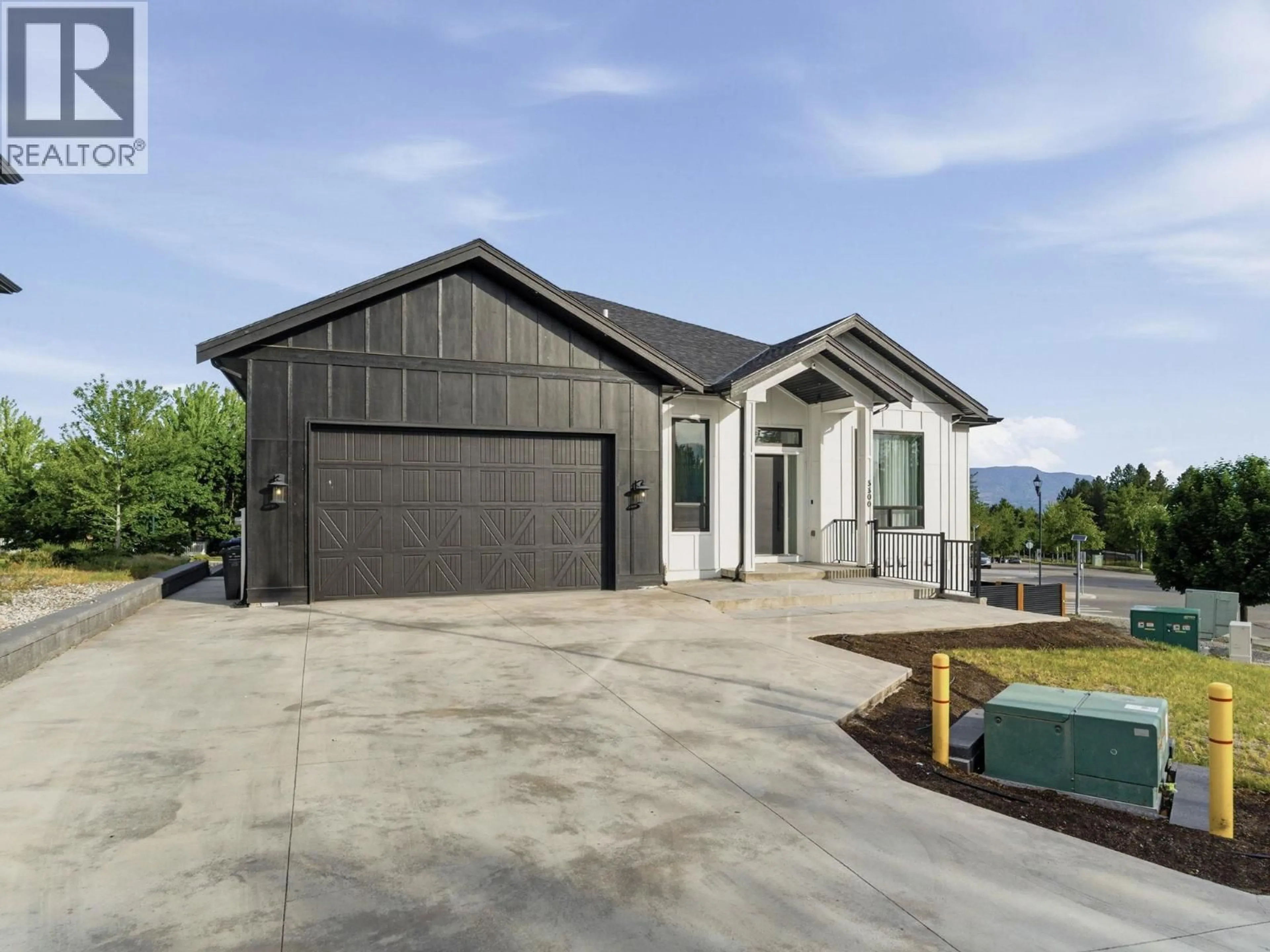 Home with vinyl exterior material, unknown for 5300 HEDEMAN COURT, Kelowna British Columbia V1W5A3