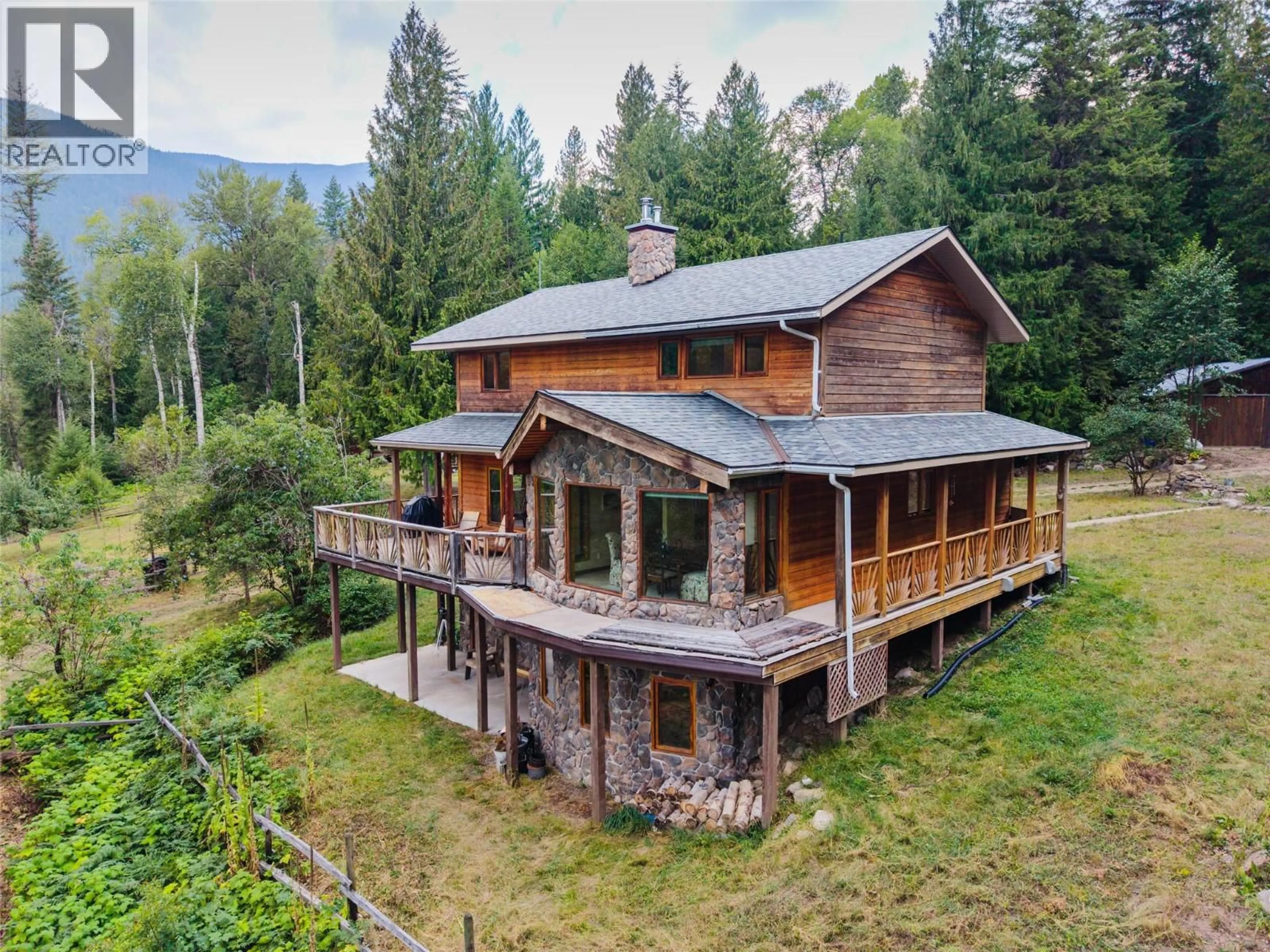 A pic from outside/outdoor area/front of a property/back of a property/a pic from drone, mountain view for 3360 LITTLE SLOCAN SOUTH ROAD, Passmore British Columbia V0G2J0