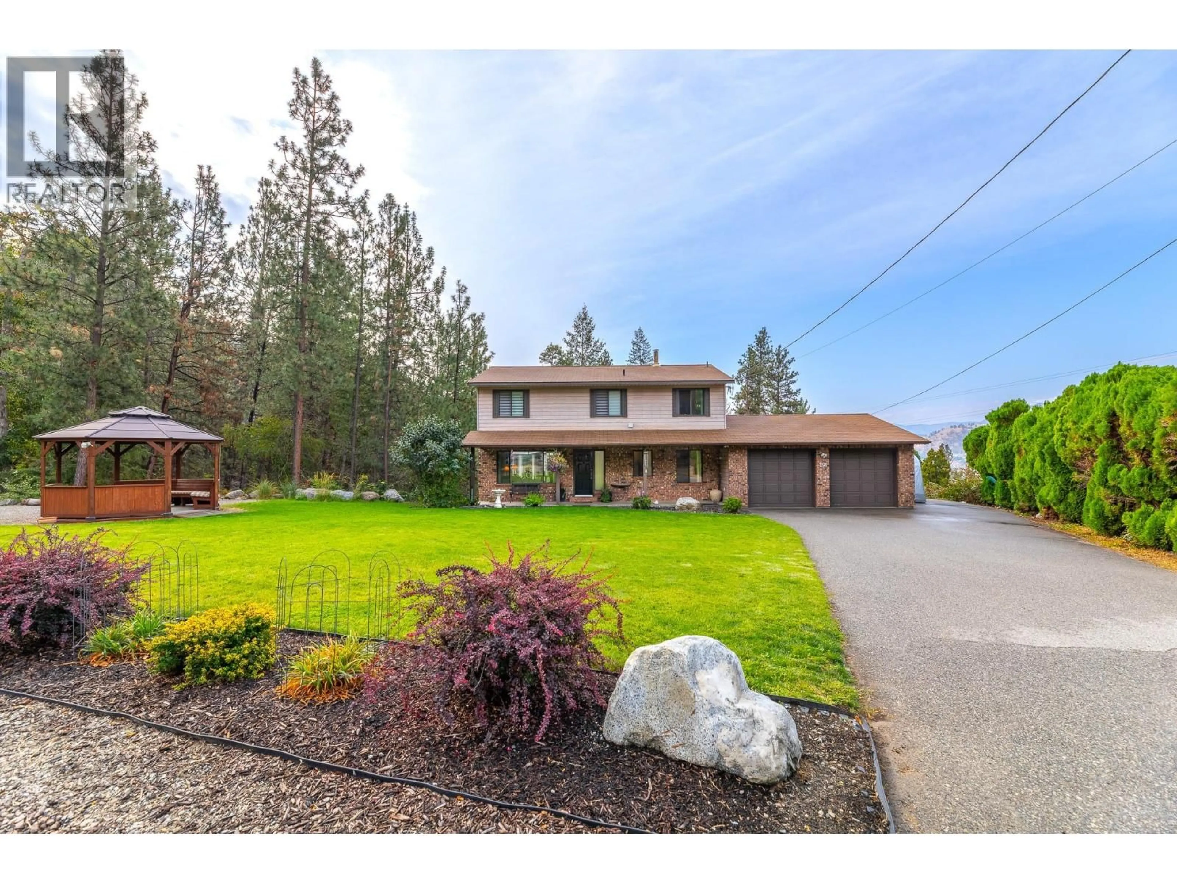 A pic from outside/outdoor area/front of a property/back of a property/a pic from drone, street for 201 SUNNYBROOK DRIVE, Okanagan Falls British Columbia V0H1R0