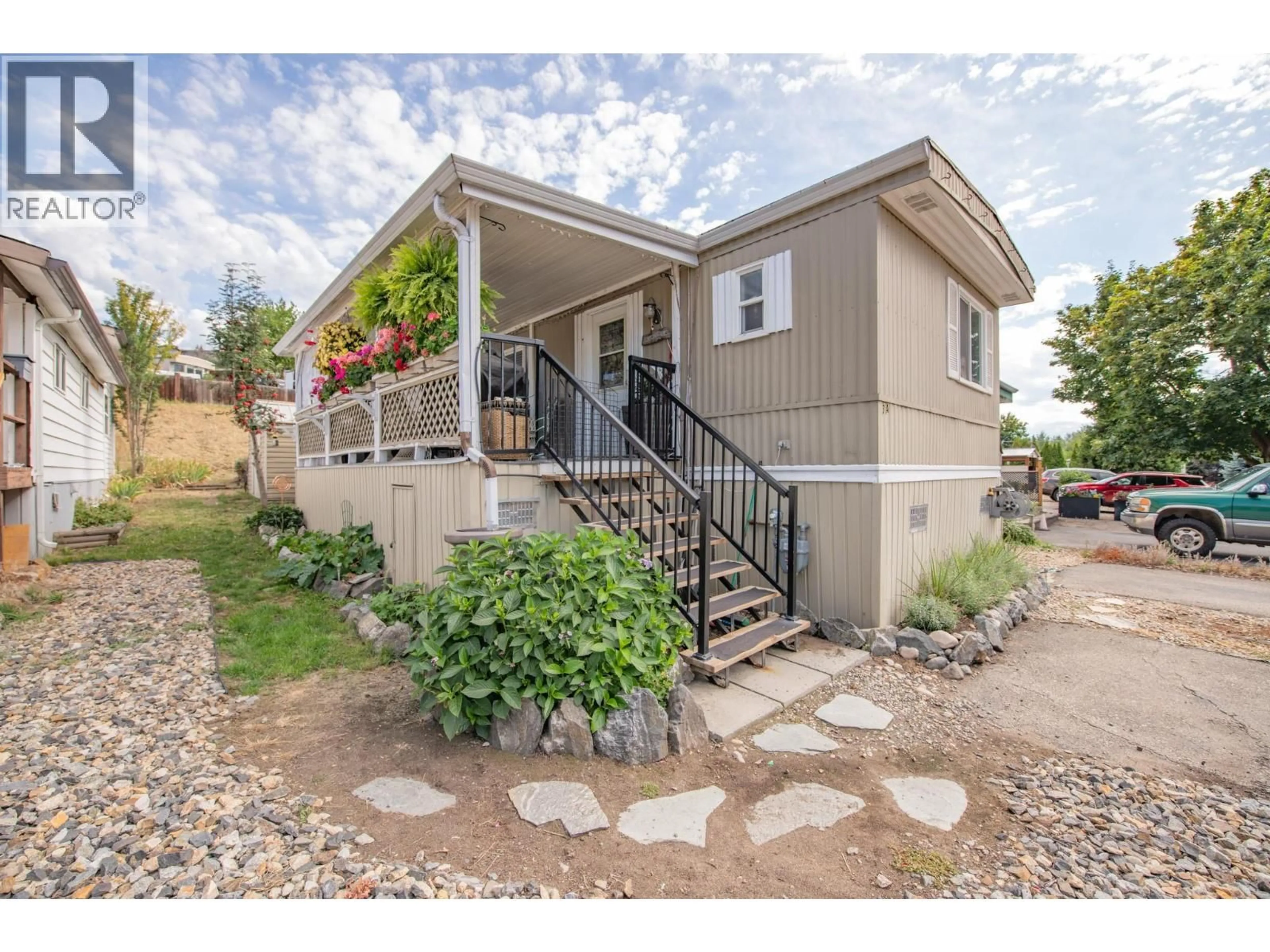 Home with vinyl exterior material, street for 3A - 15401 KALAMALKA LAKE ROAD, Coldstream British Columbia V1B1Z3