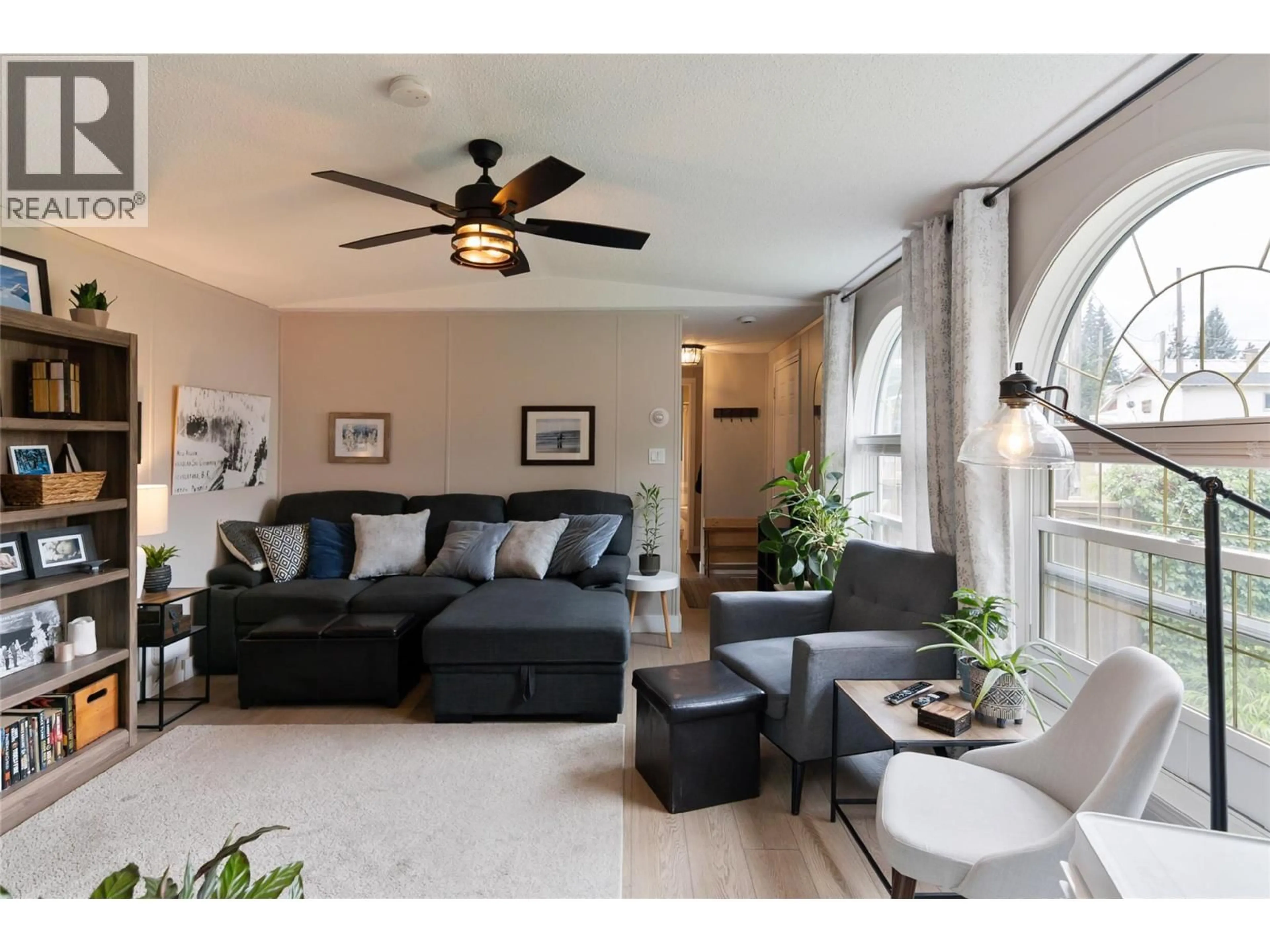 Living room with furniture, wood/laminate floor for 11 - 606 EDWARD STREET, Revelstoke British Columbia V0E2S0