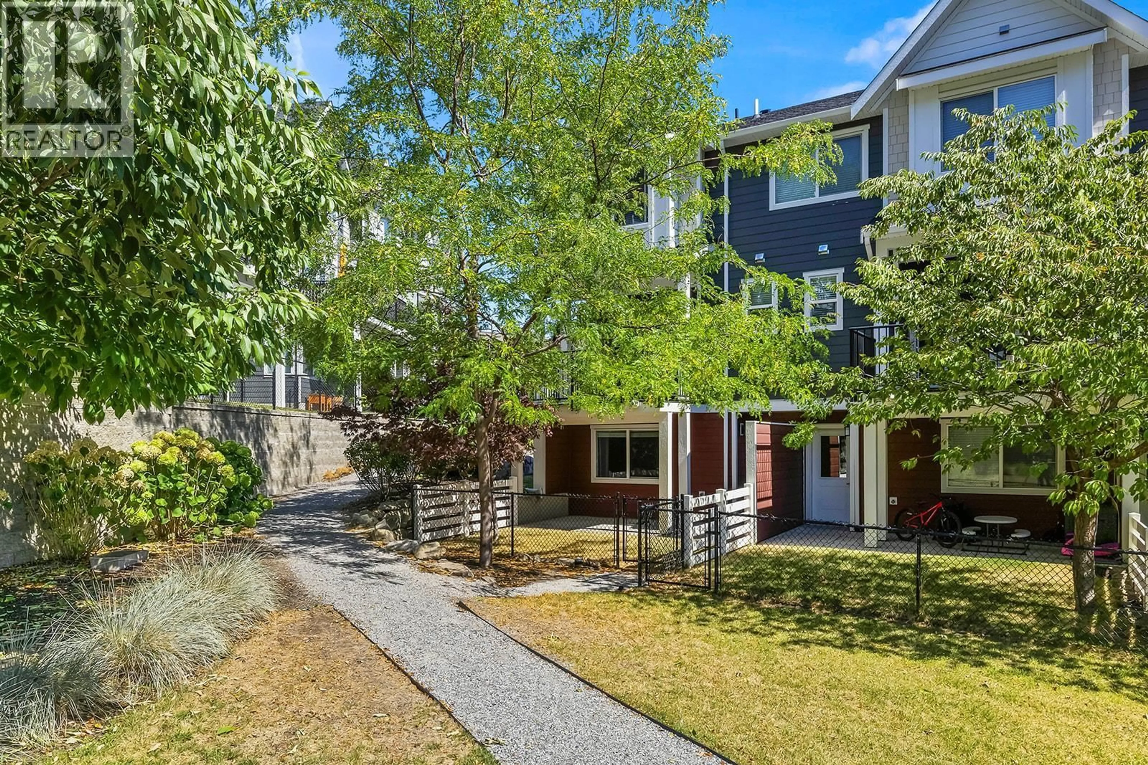 A pic from outside/outdoor area/front of a property/back of a property/a pic from drone, street for 21 - 2490 TUSCANY DRIVE, West Kelowna British Columbia V4T3M4