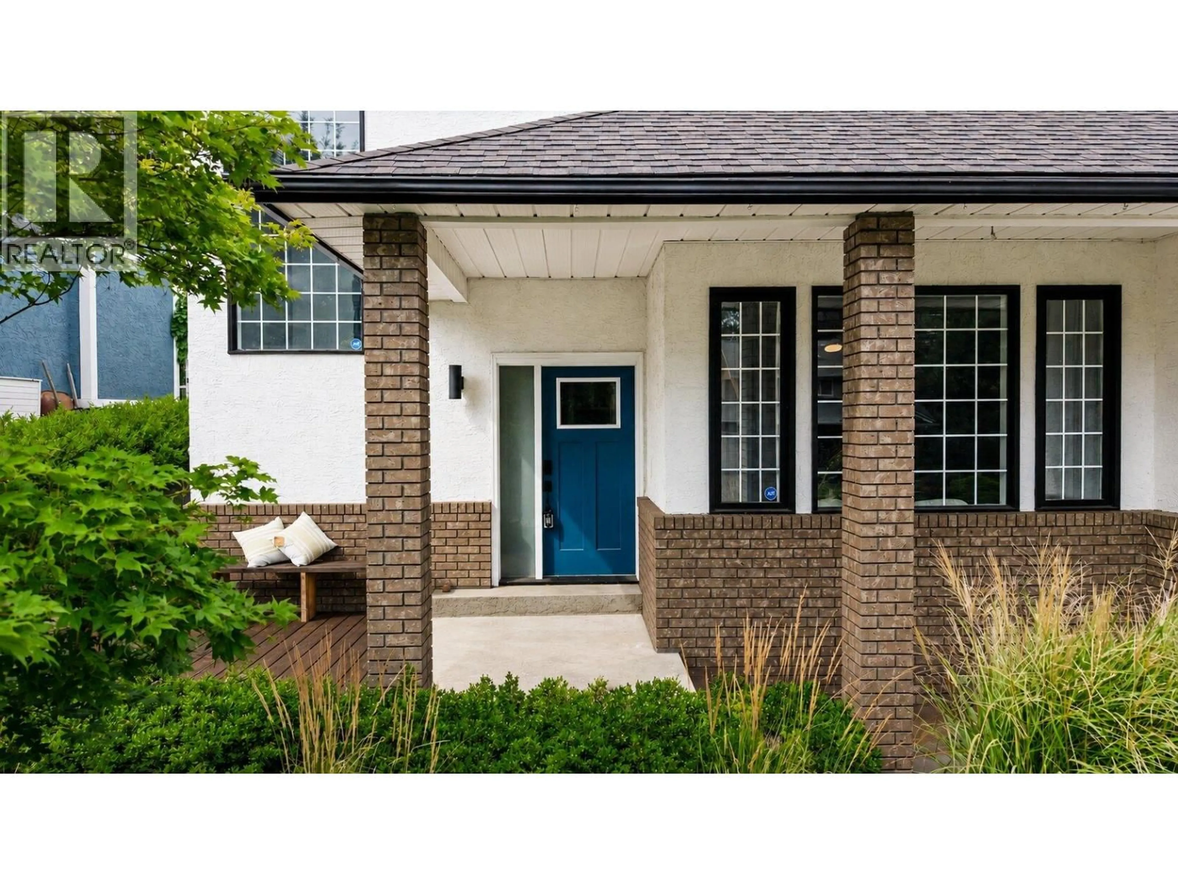 Home with brick exterior material, street for 670 CASSIAR ROAD, Kelowna British Columbia V1V1M6