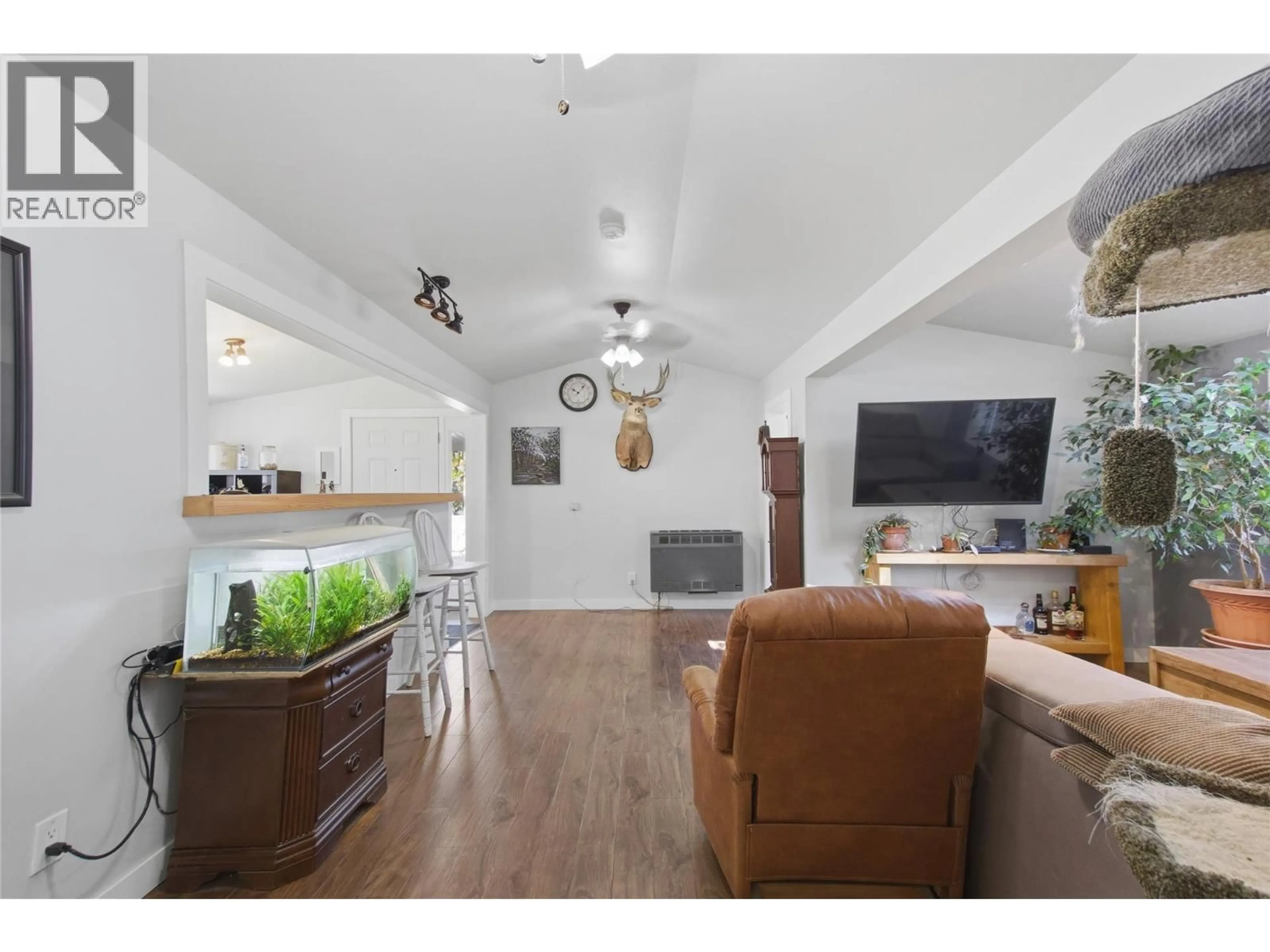 Living room with furniture, wood/laminate floor for 80 VAVASOUR ROAD, Kamloops British Columbia V0K2J0