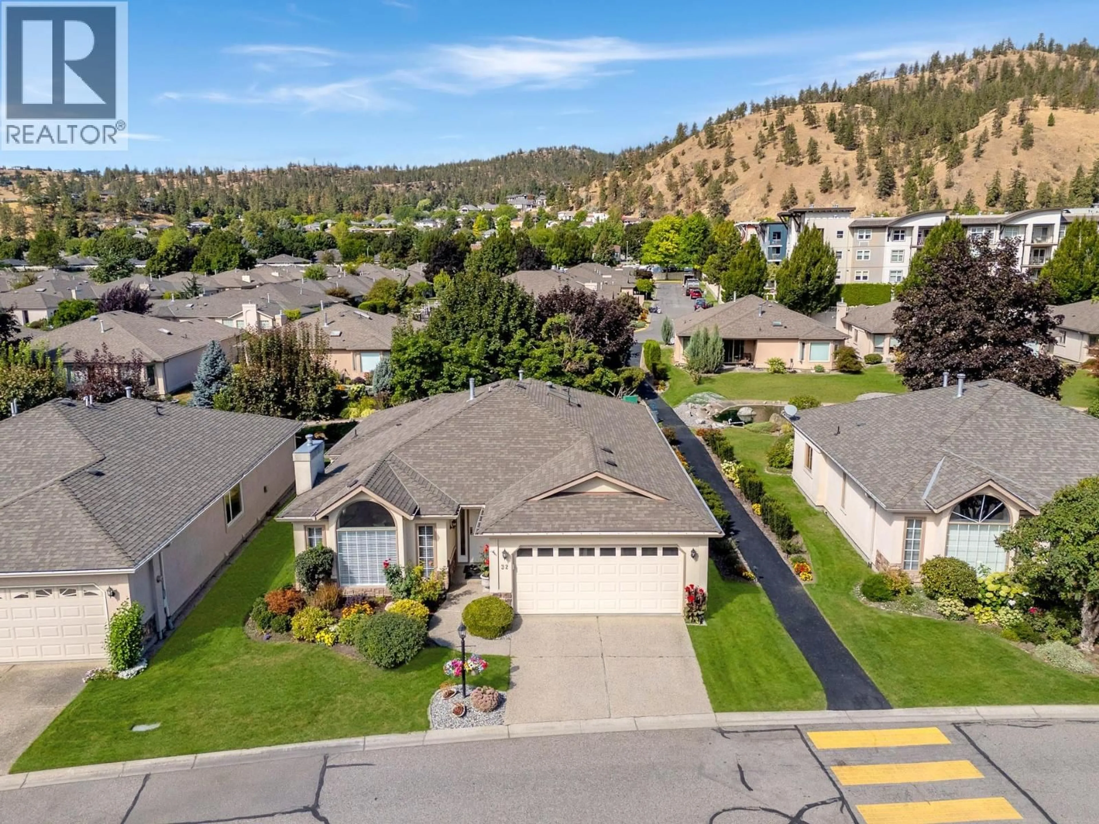 A pic from outside/outdoor area/front of a property/back of a property/a pic from drone, mountain view for 32 - 595 YATES ROAD, Kelowna British Columbia V1V1P8