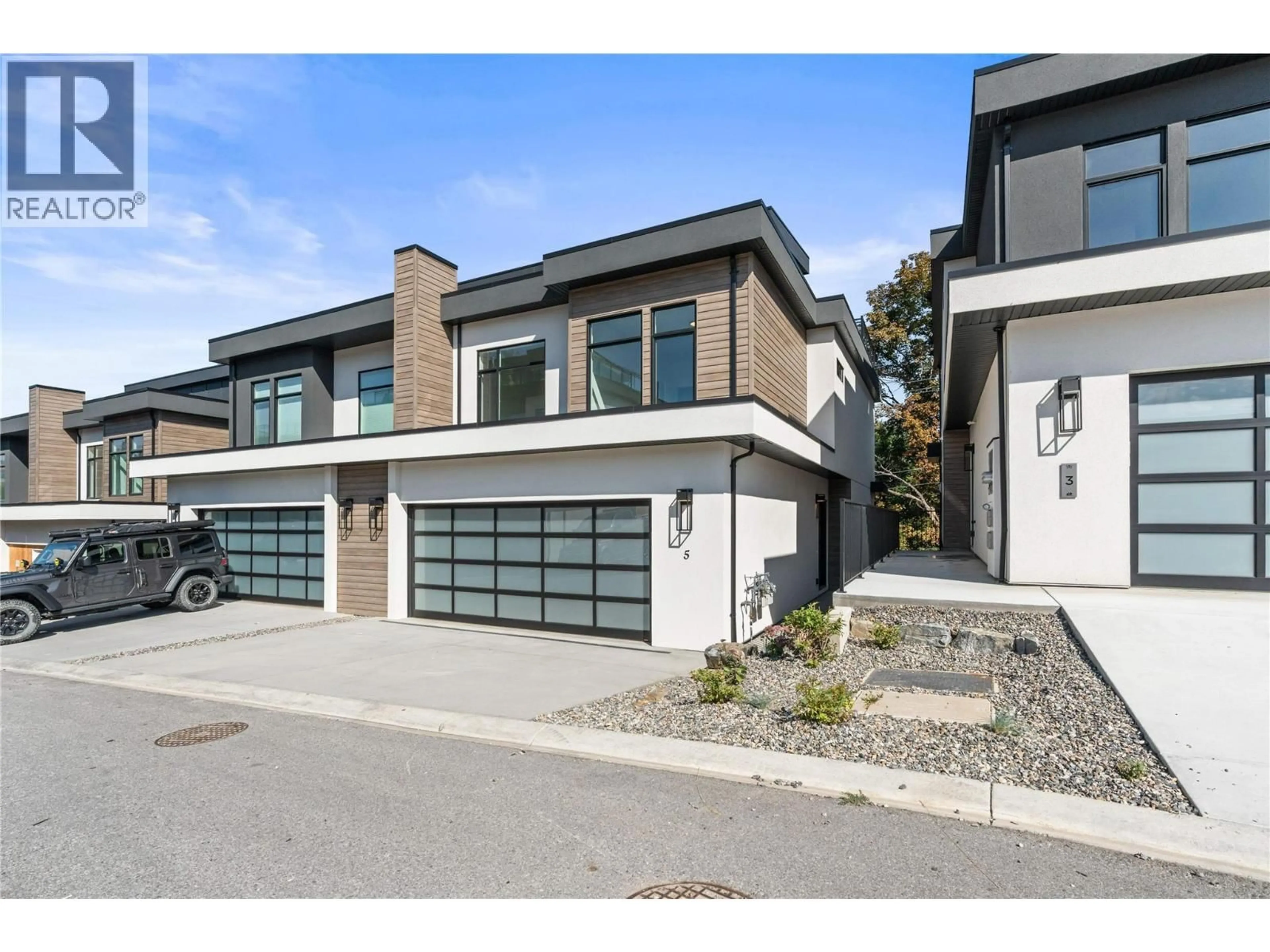 Home with brick exterior material, street for 9 - 7920 KIDSTON ROAD, Coldstream British Columbia V1B0B4