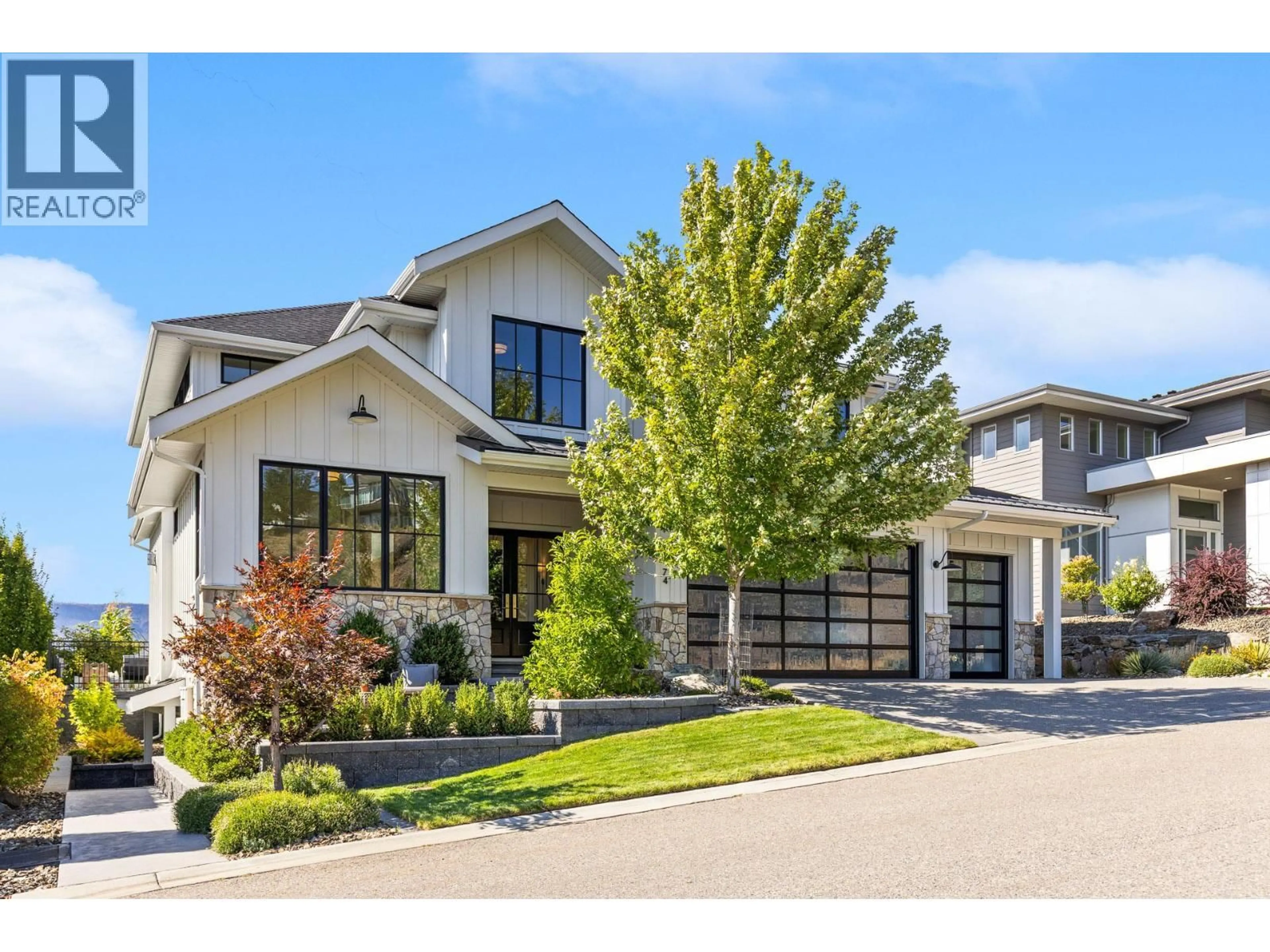Home with brick exterior material, street for 74 RED SKY COURT, Kelowna British Columbia V1V3G4