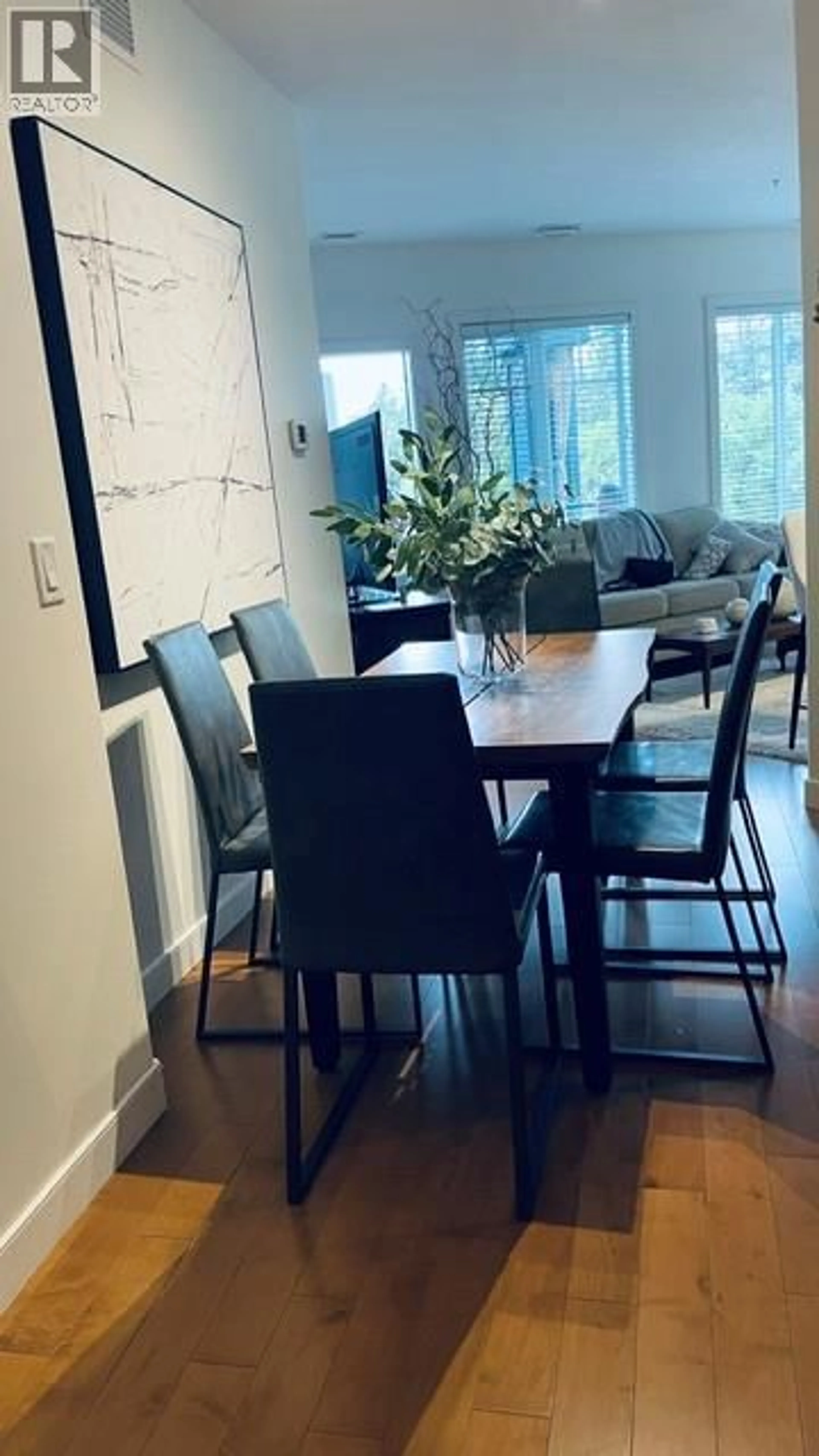Dining room, wood/laminate floor for 211 - 3645 CARRINGTON ROAD, West Kelowna British Columbia V4T3G9