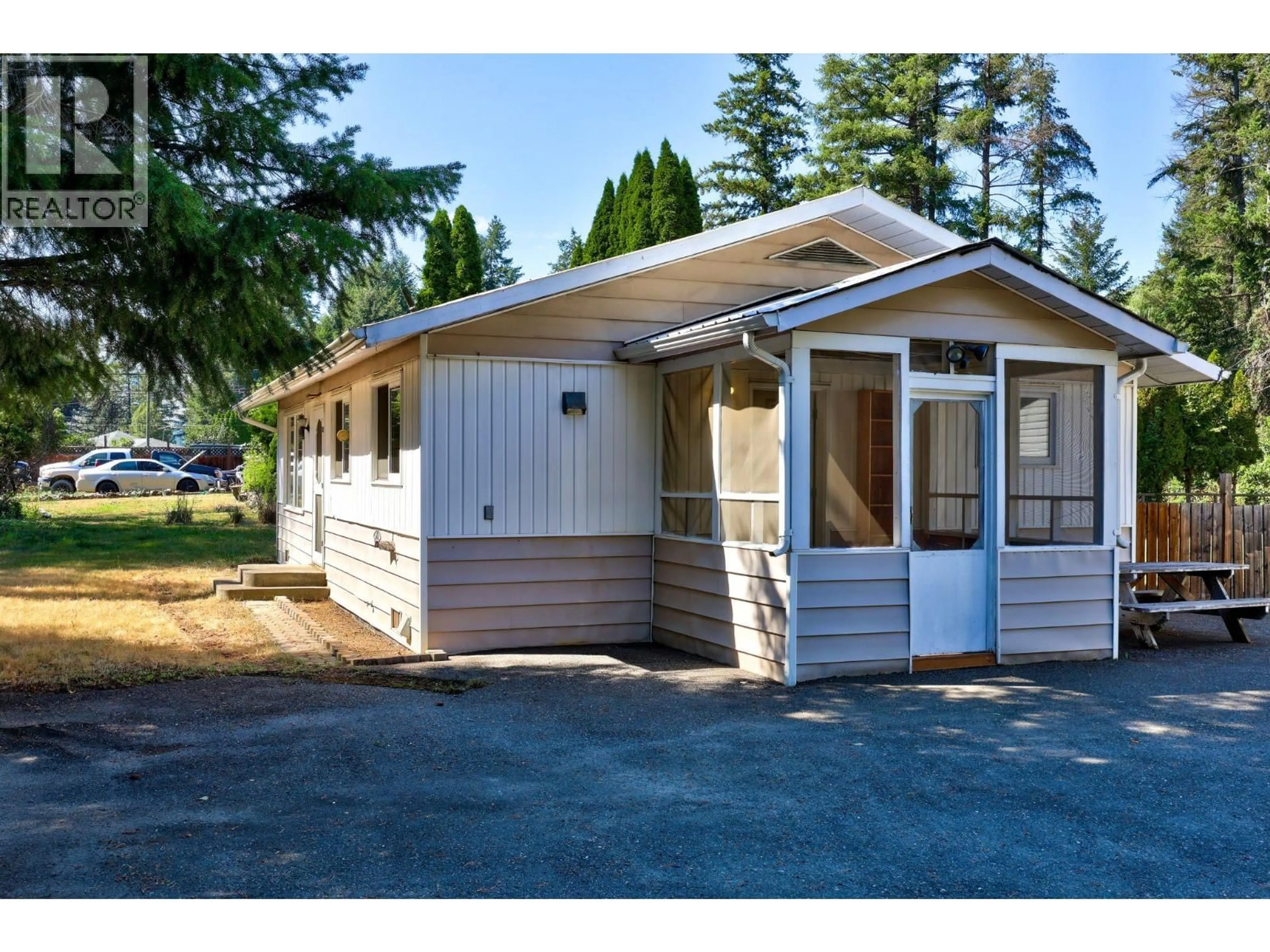 Home with vinyl exterior material, street for 4264 DUNSMUIR ROAD, Barriere British Columbia V0E1E0