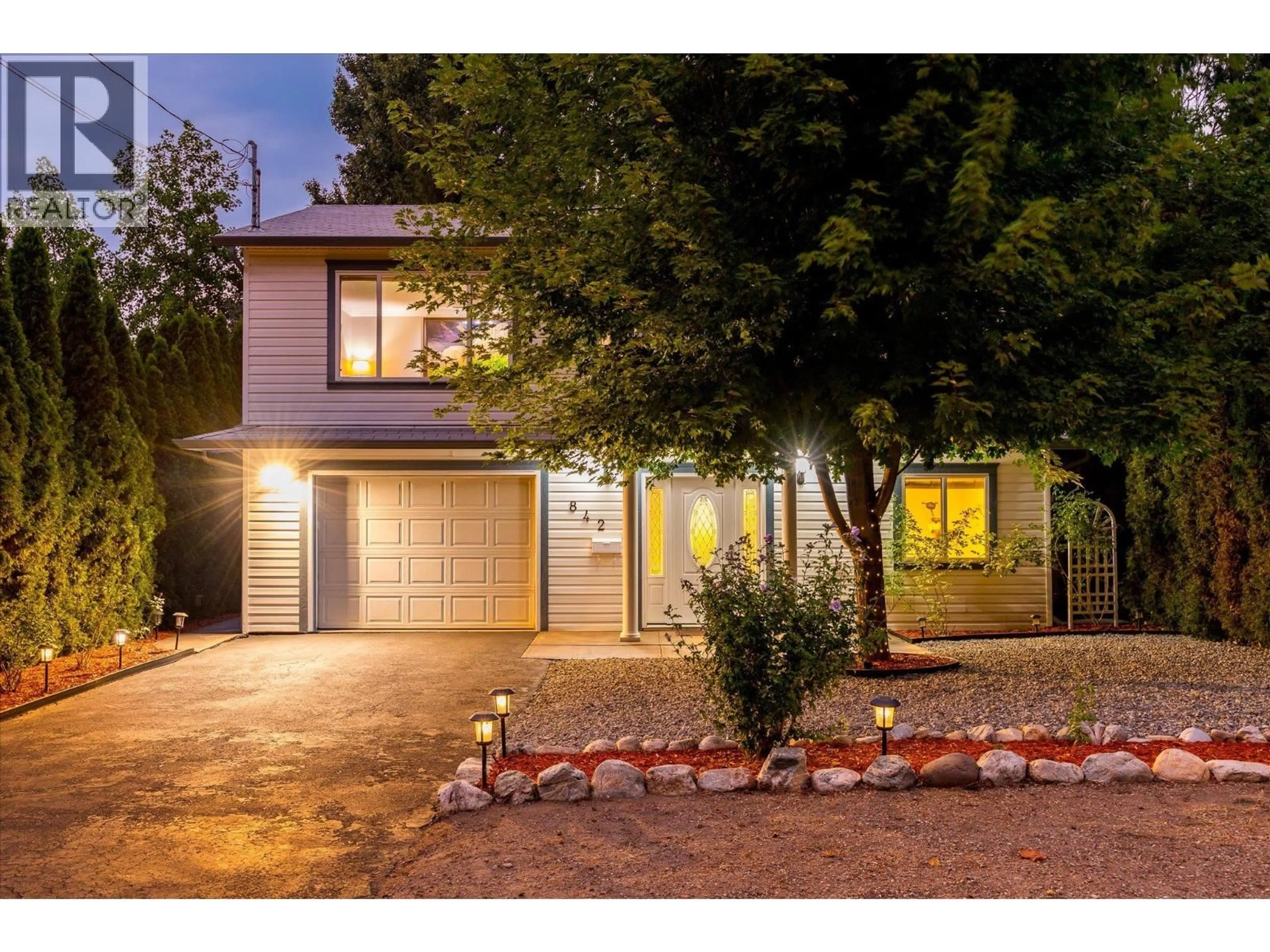 Home with brick exterior material, street for 842 RAYMER ROAD, Kelowna British Columbia V1W1J8