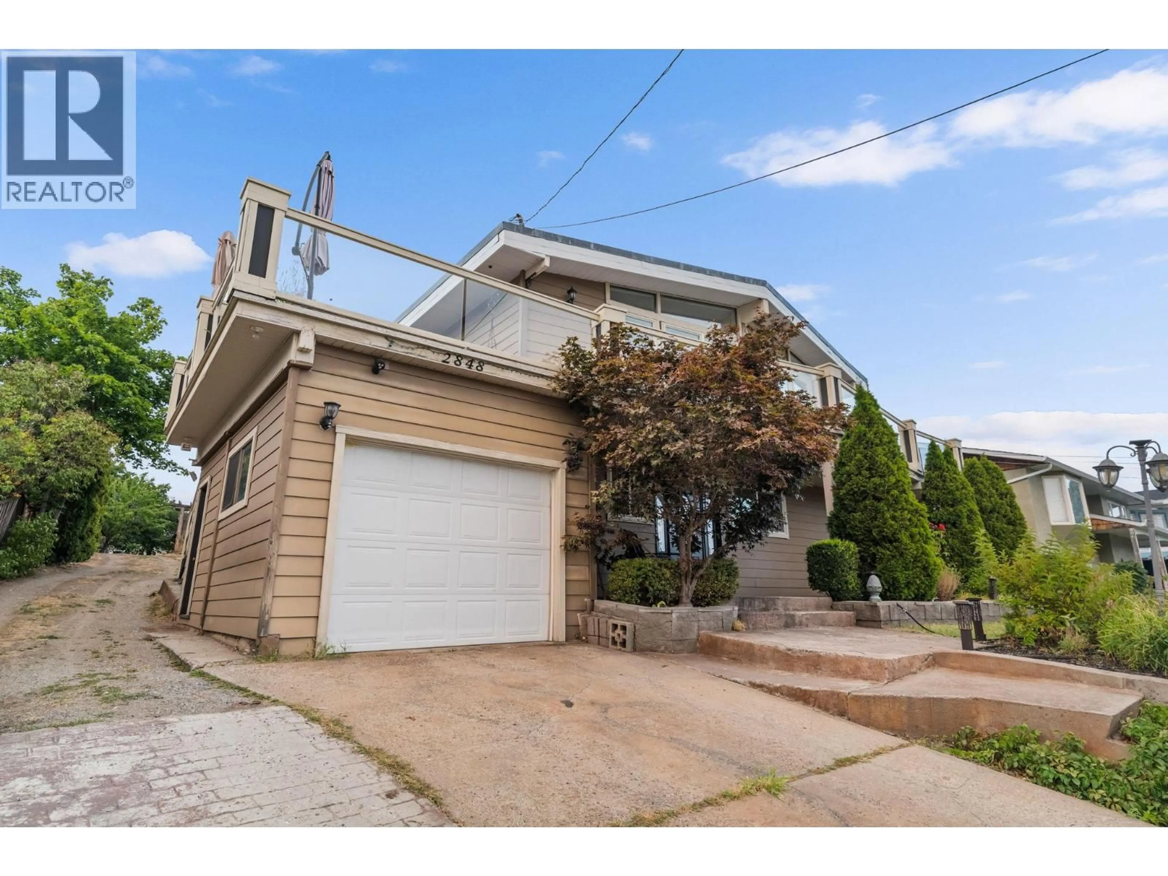 Home with vinyl exterior material, street for 2848 INVERNESS ROAD, West Kelowna British Columbia V4T1J5
