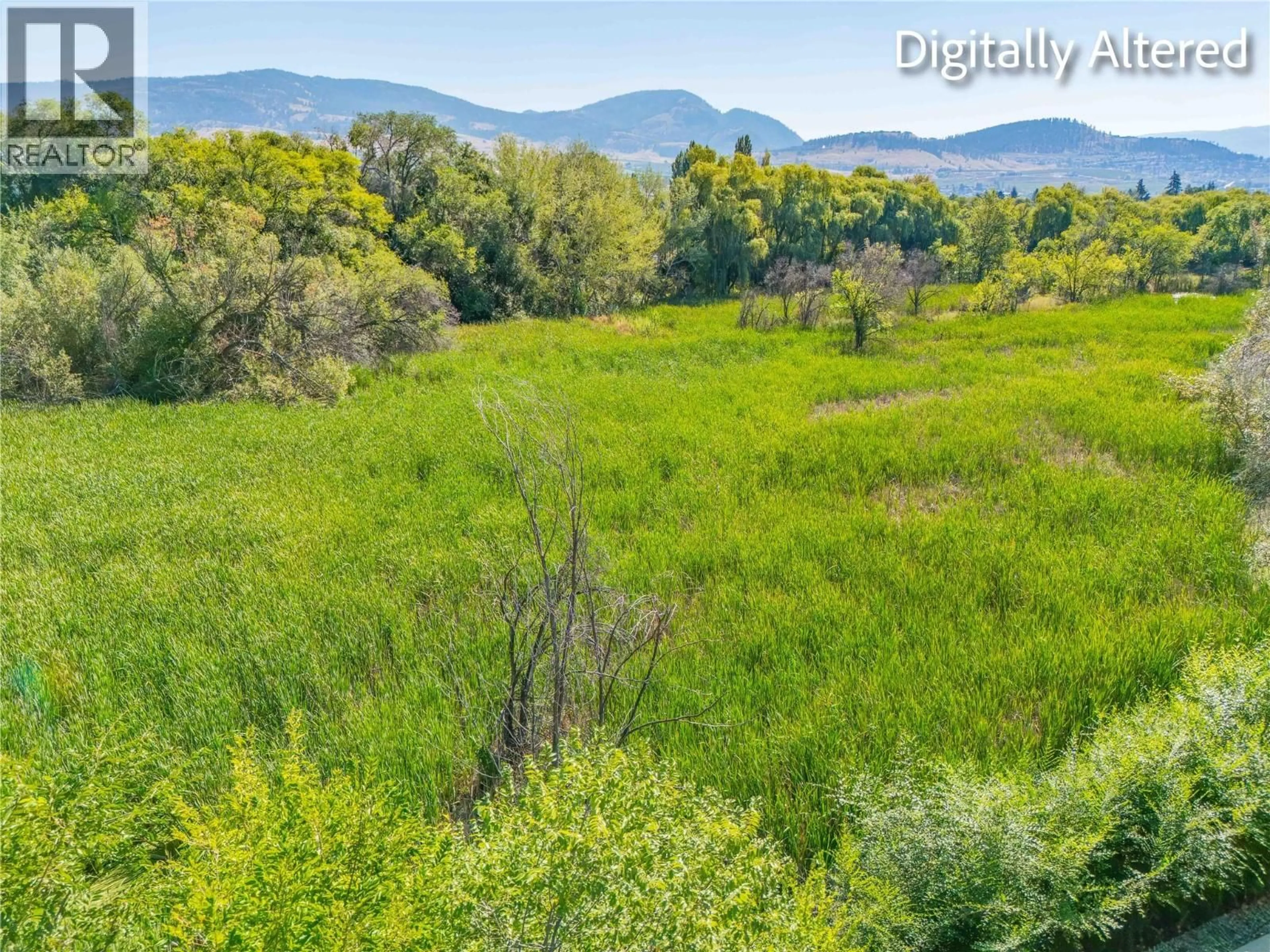 A pic from outside/outdoor area/front of a property/back of a property/a pic from drone, forest/trees view for 134 - 1355 FINDLAY ROAD, Kelowna British Columbia V1X8B8