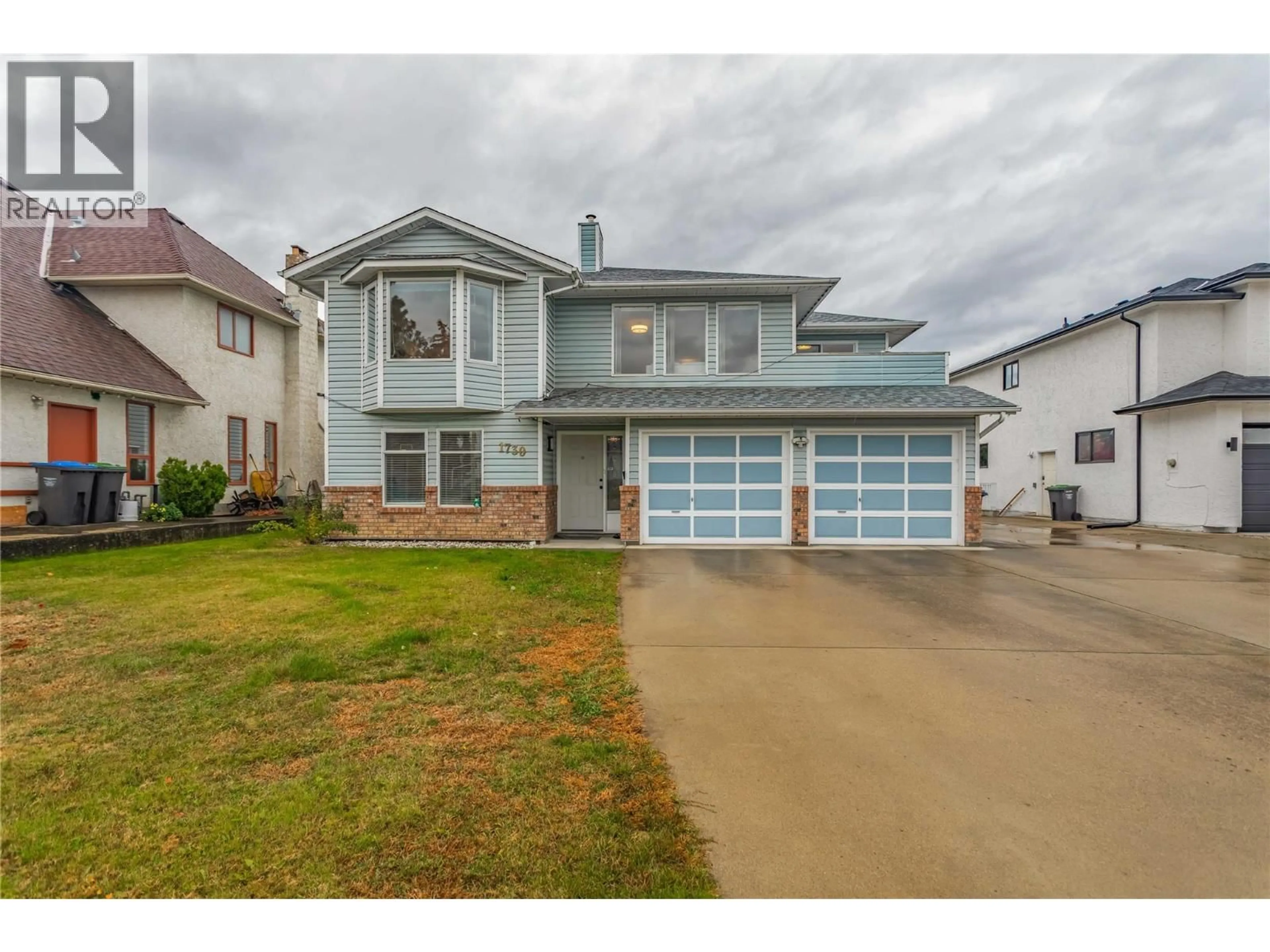 Home with vinyl exterior material, street for 1730 SIMPSON COURT, Kelowna British Columbia V1X7C1