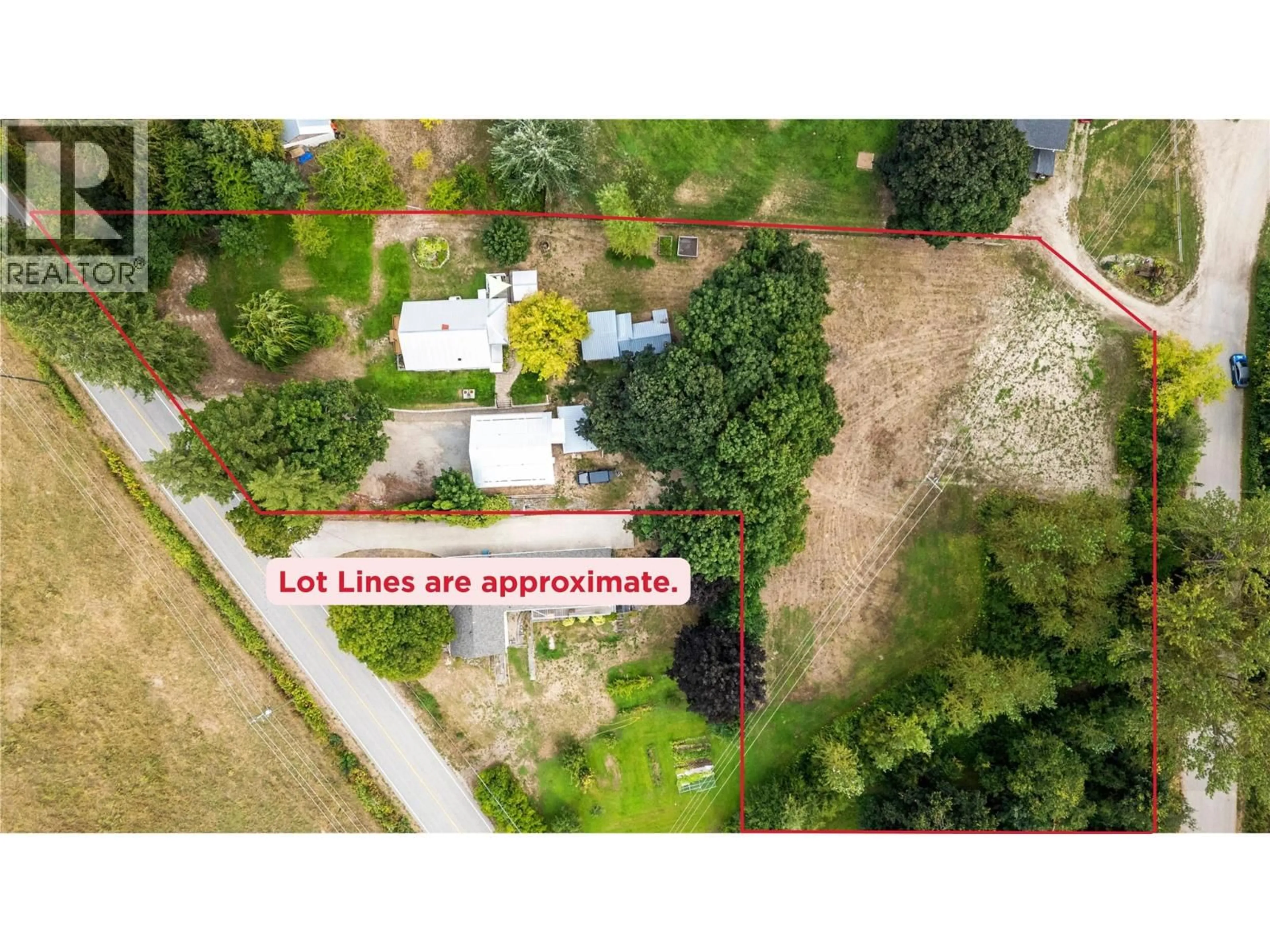A pic from outside/outdoor area/front of a property/back of a property/a pic from drone, street for 410 FOOTHILL ROAD SOUTHWEST, Salmon Arm British Columbia V1E1T6