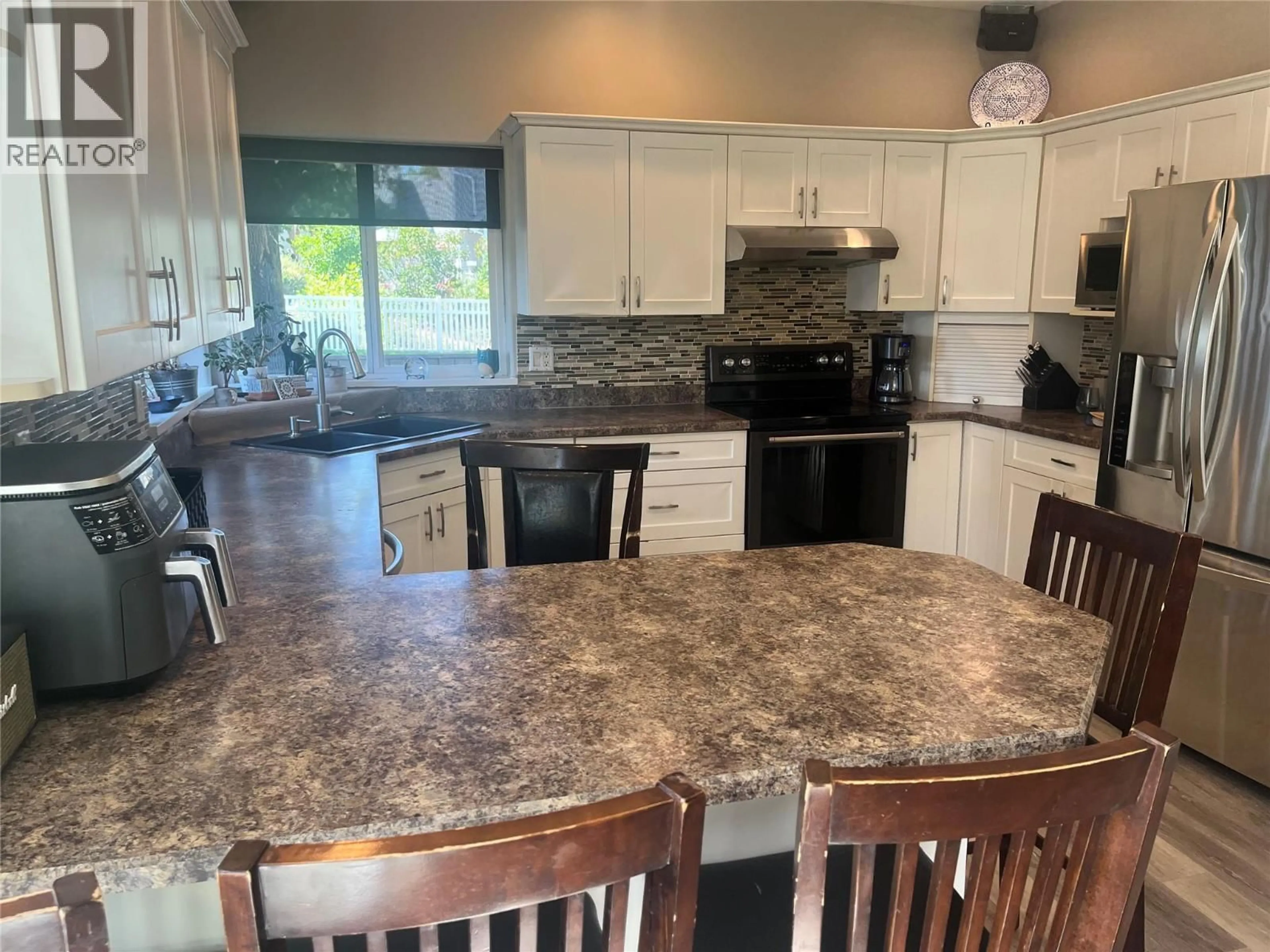 Open concept kitchen, ceramic/tile floor for 2003 PANORAMA COURT, Kamloops British Columbia V2E2S1
