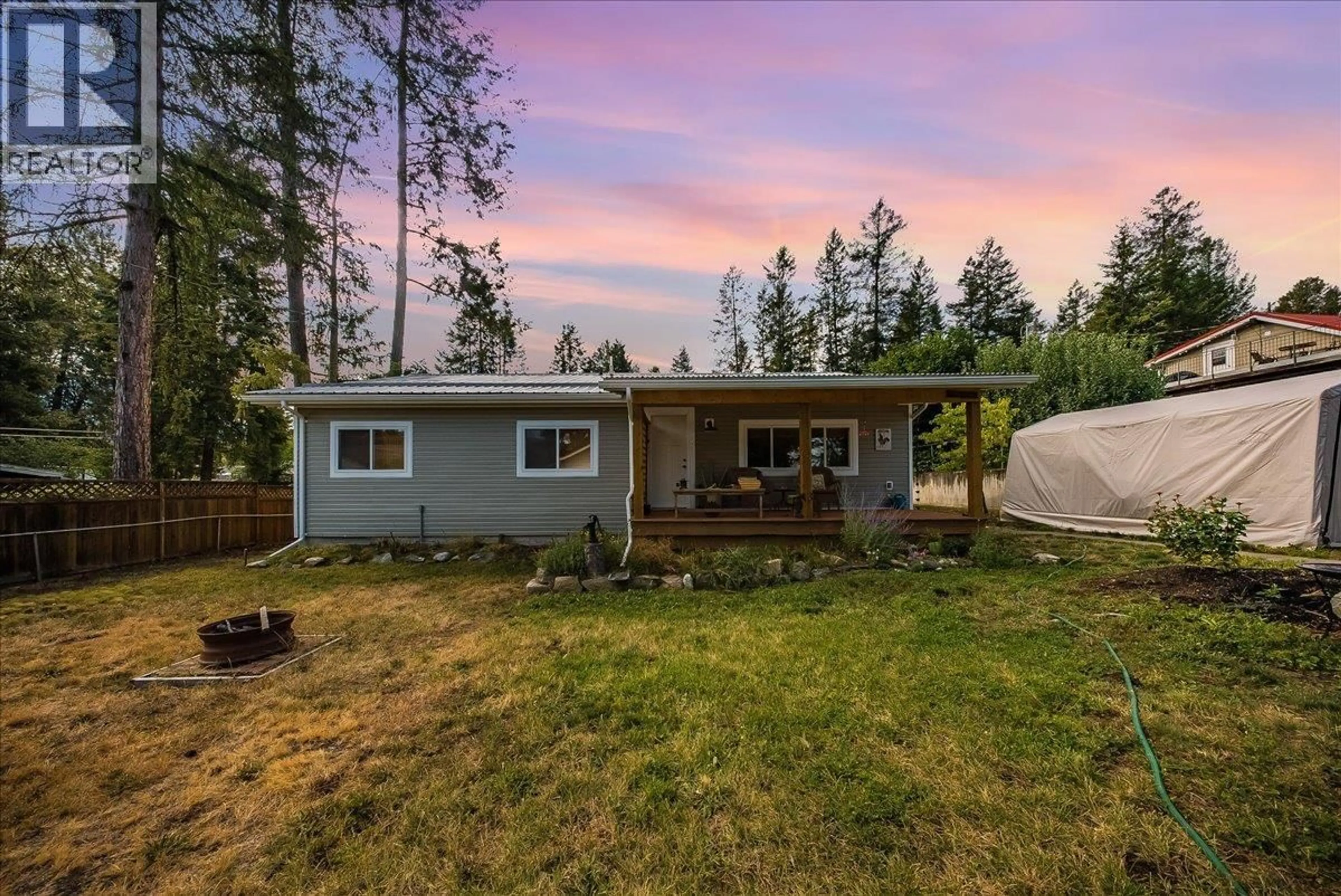 A pic from outside/outdoor area/front of a property/back of a property/a pic from drone, unknown for 91 HOLMES ROAD, Christina Lake British Columbia V0H1E0