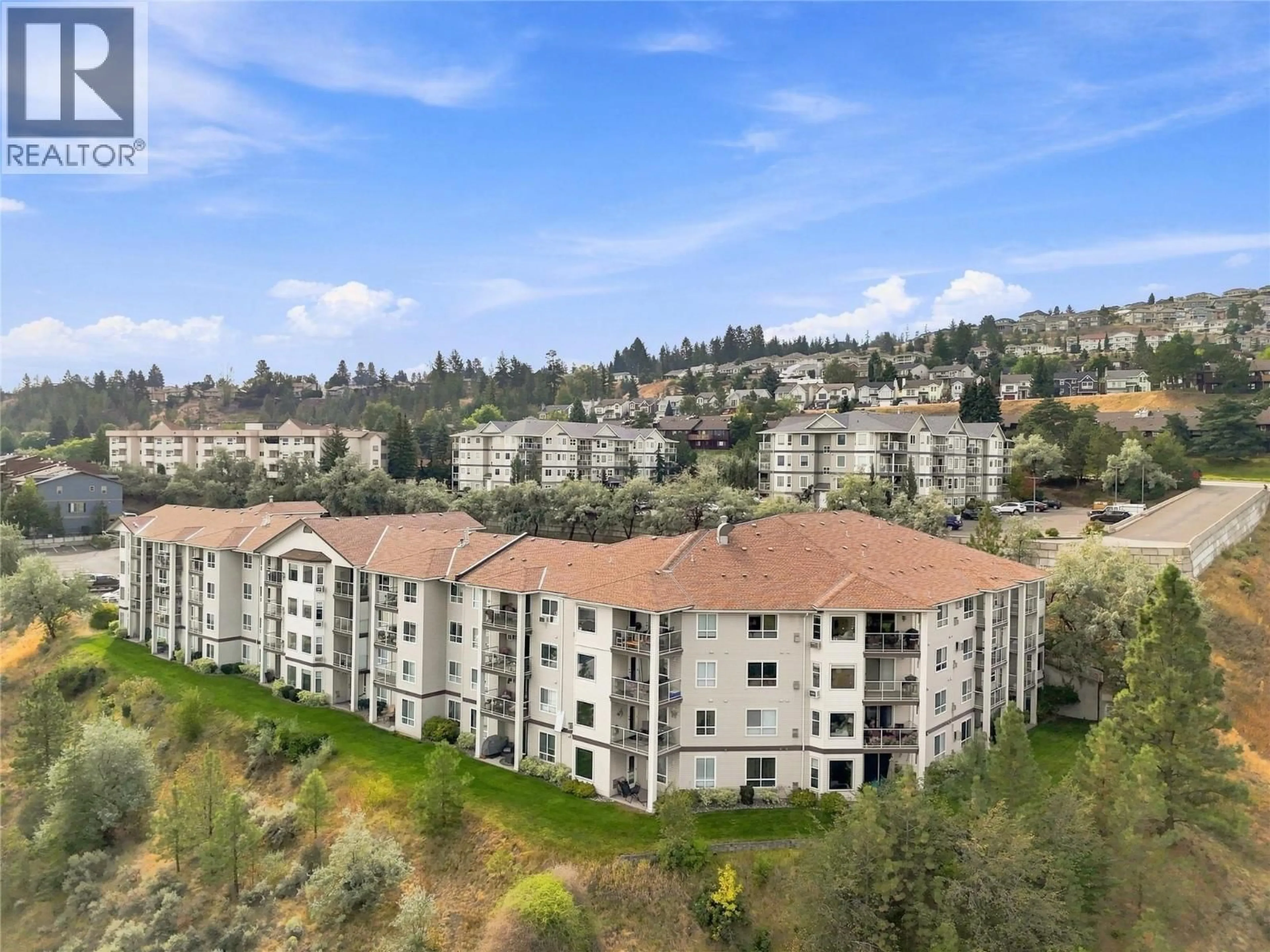 A pic from outside/outdoor area/front of a property/back of a property/a pic from drone, mountain view for 214 - 1120 HUGH ALLAN DRIVE, Kamloops British Columbia V1S1T4
