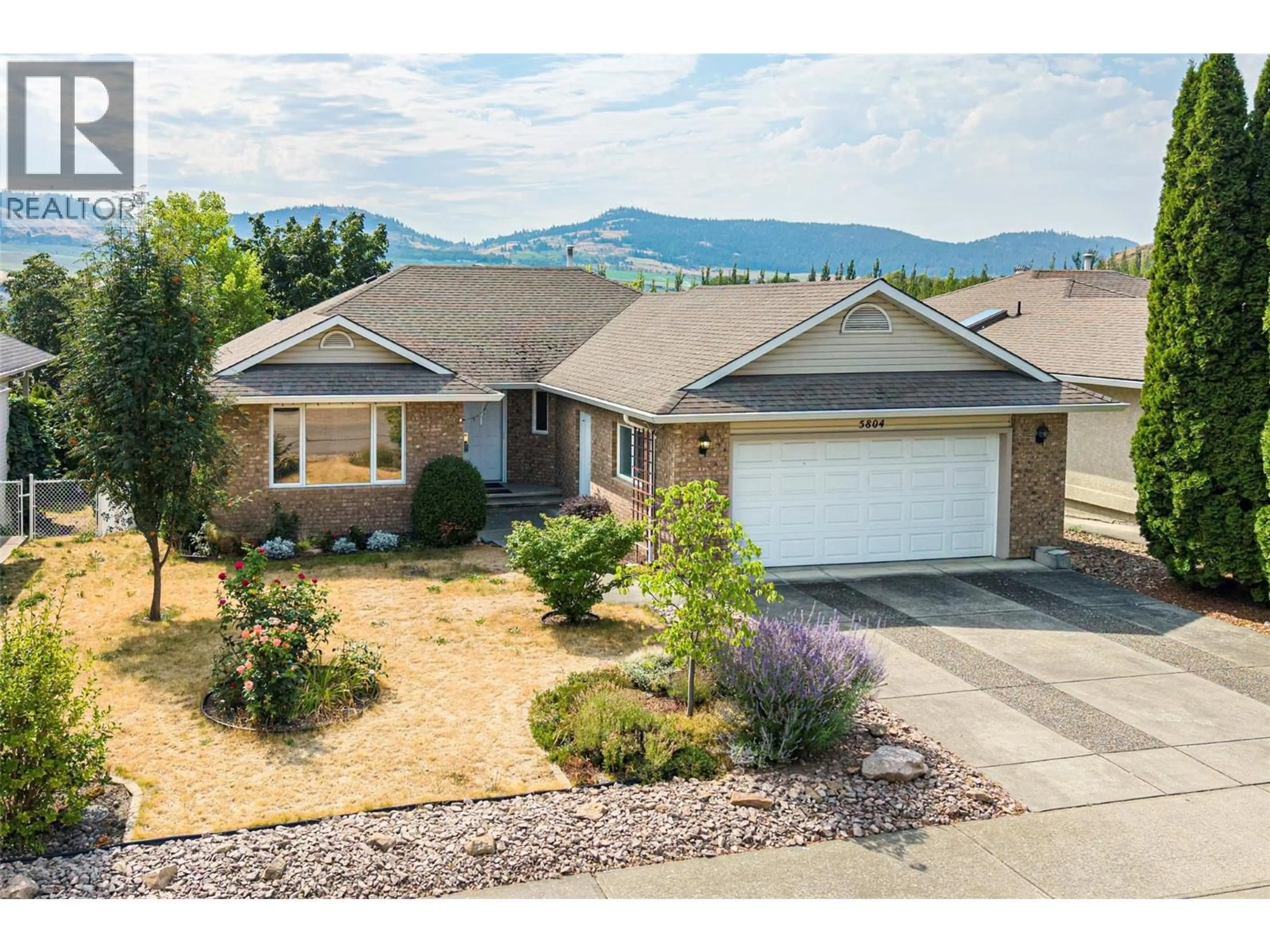 A pic from outside/outdoor area/front of a property/back of a property/a pic from drone, mountain view for 5804 RICHFIELD DRIVE, Vernon British Columbia V1H1A7