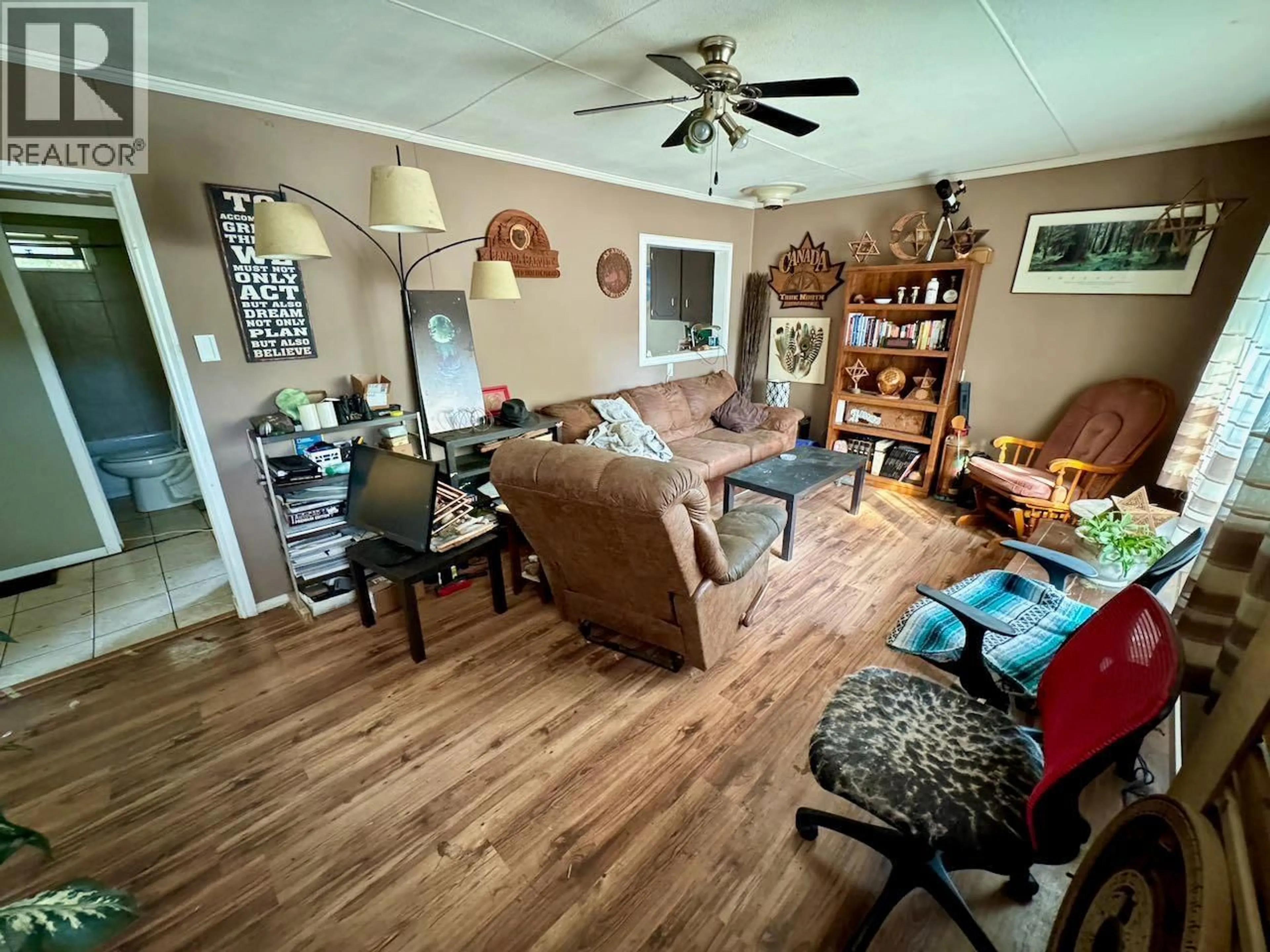 Living room with furniture, wood/laminate floor for 223 LARCH AVENUE, Kamloops British Columbia V2B1C8