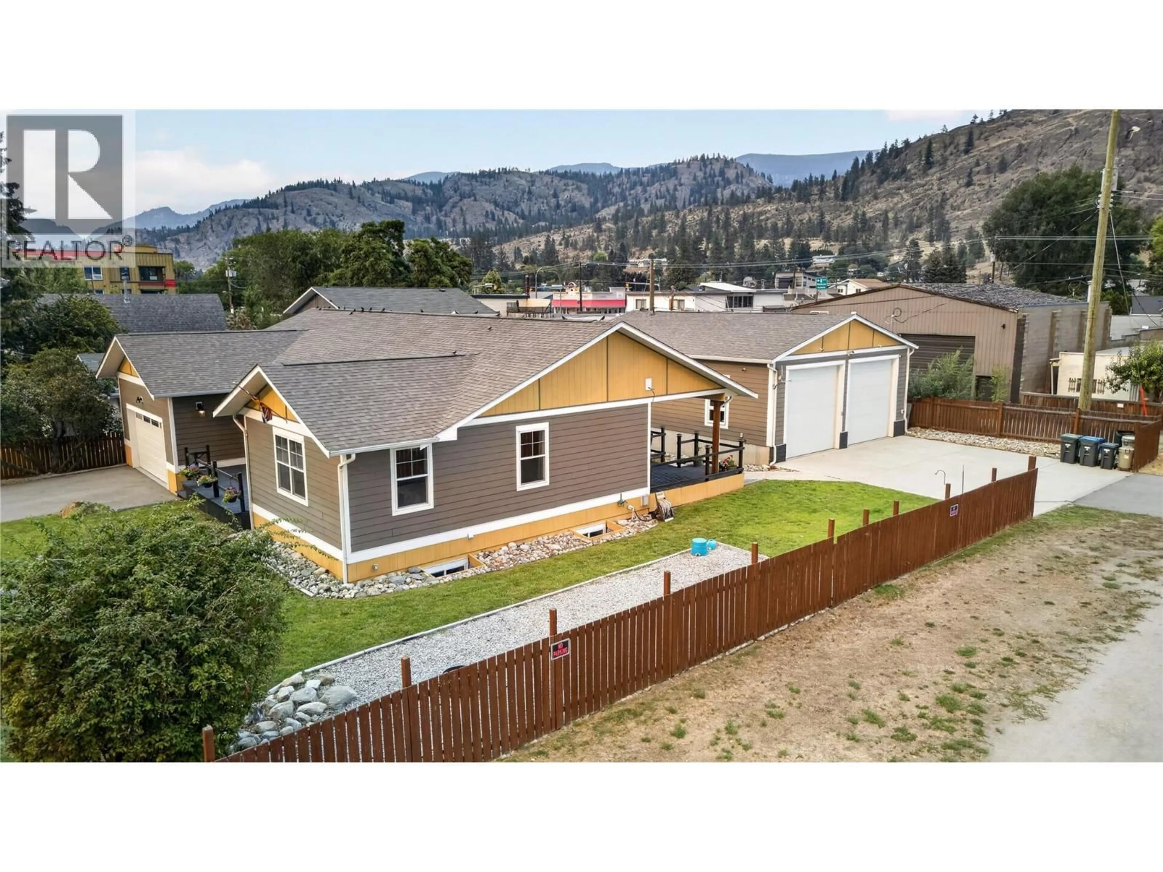 A pic from outside/outdoor area/front of a property/back of a property/a pic from drone, mountain view for 941 WILLOW STREET, Okanagan Falls British Columbia V0H1R0