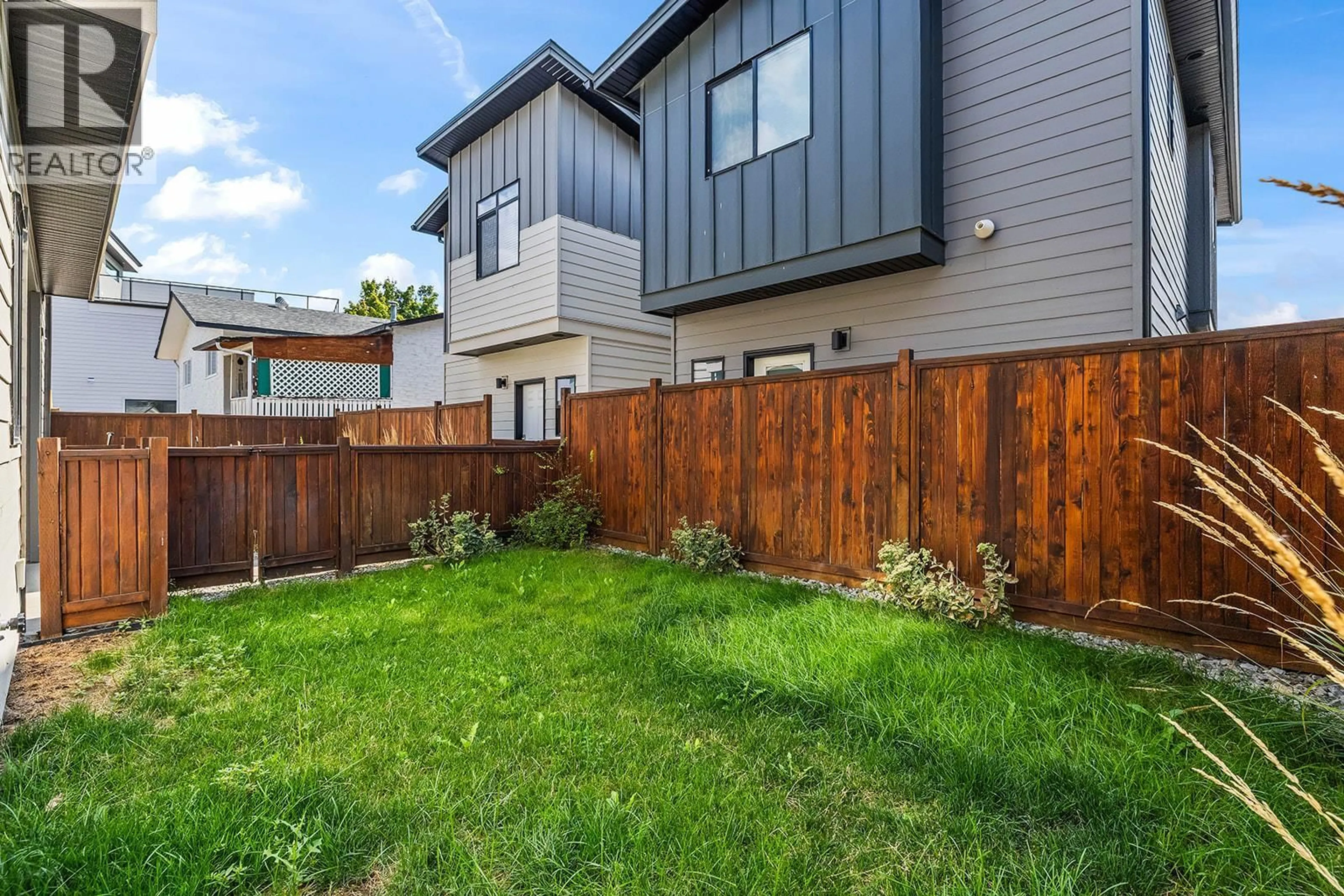 Home with vinyl exterior material, street for 1 - 726 COOPLAND CRESCENT, Kelowna British Columbia V1Y2V1