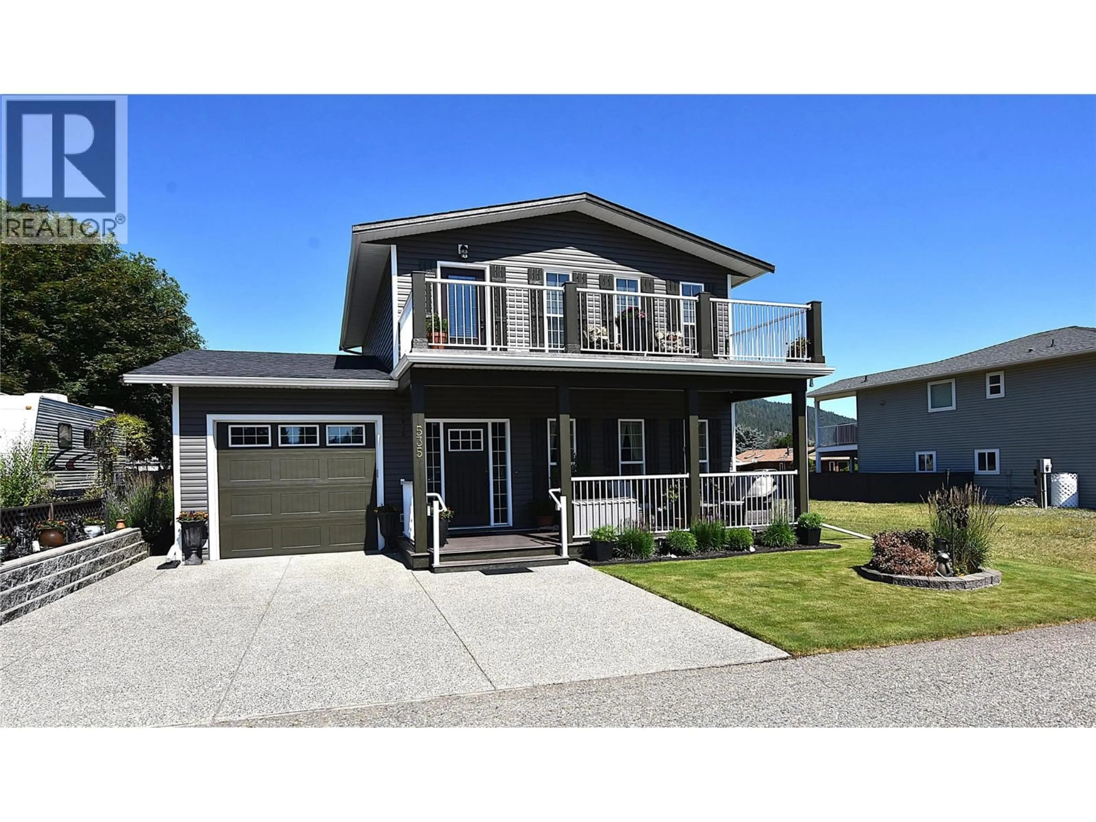Home with vinyl exterior material, street for 535 LOON AVENUE, Vernon British Columbia V1H2A1