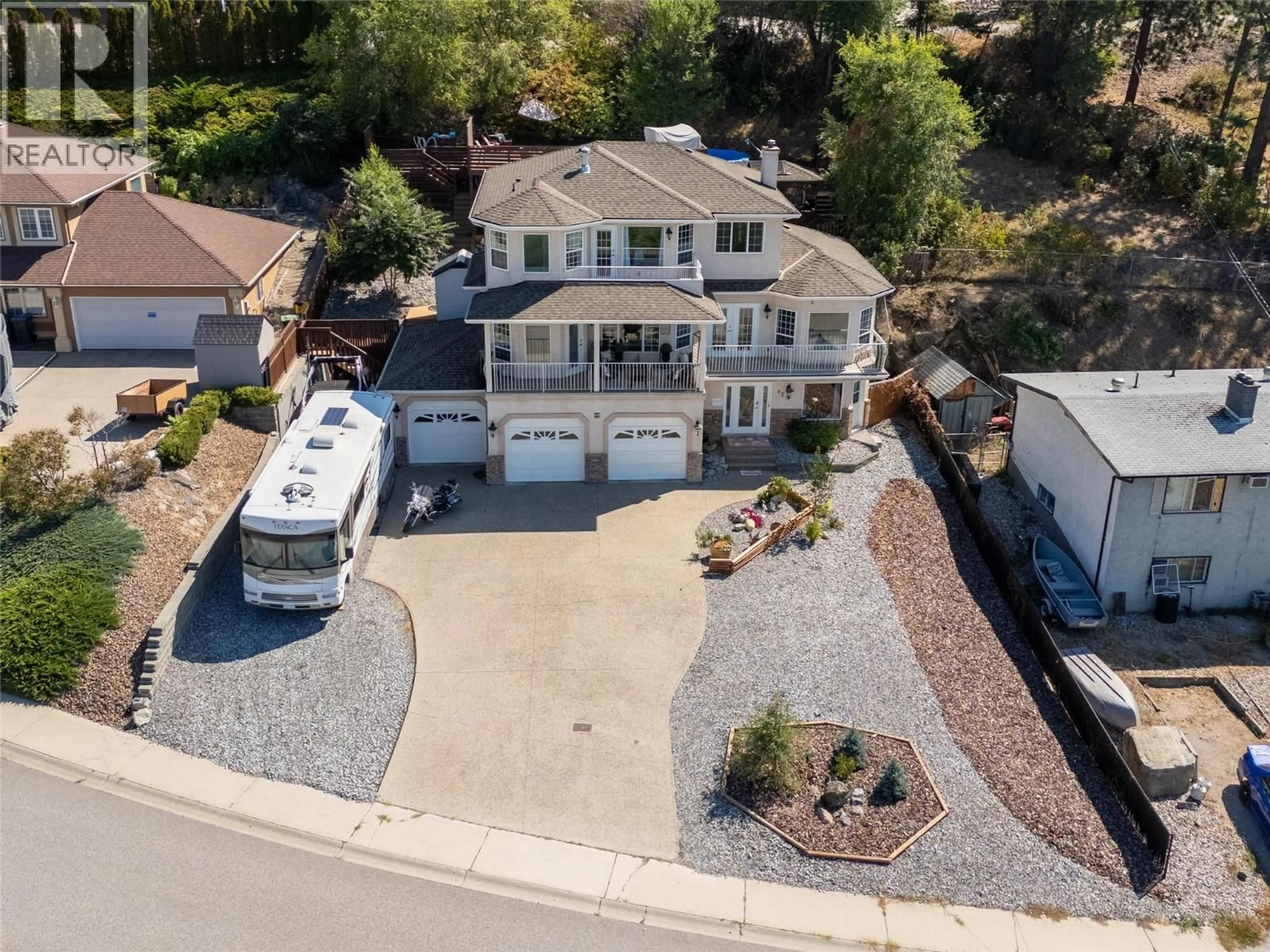A pic from outside/outdoor area/front of a property/back of a property/a pic from drone, unknown for 825 TOOVEY ROAD, Kelowna British Columbia V1X6P9