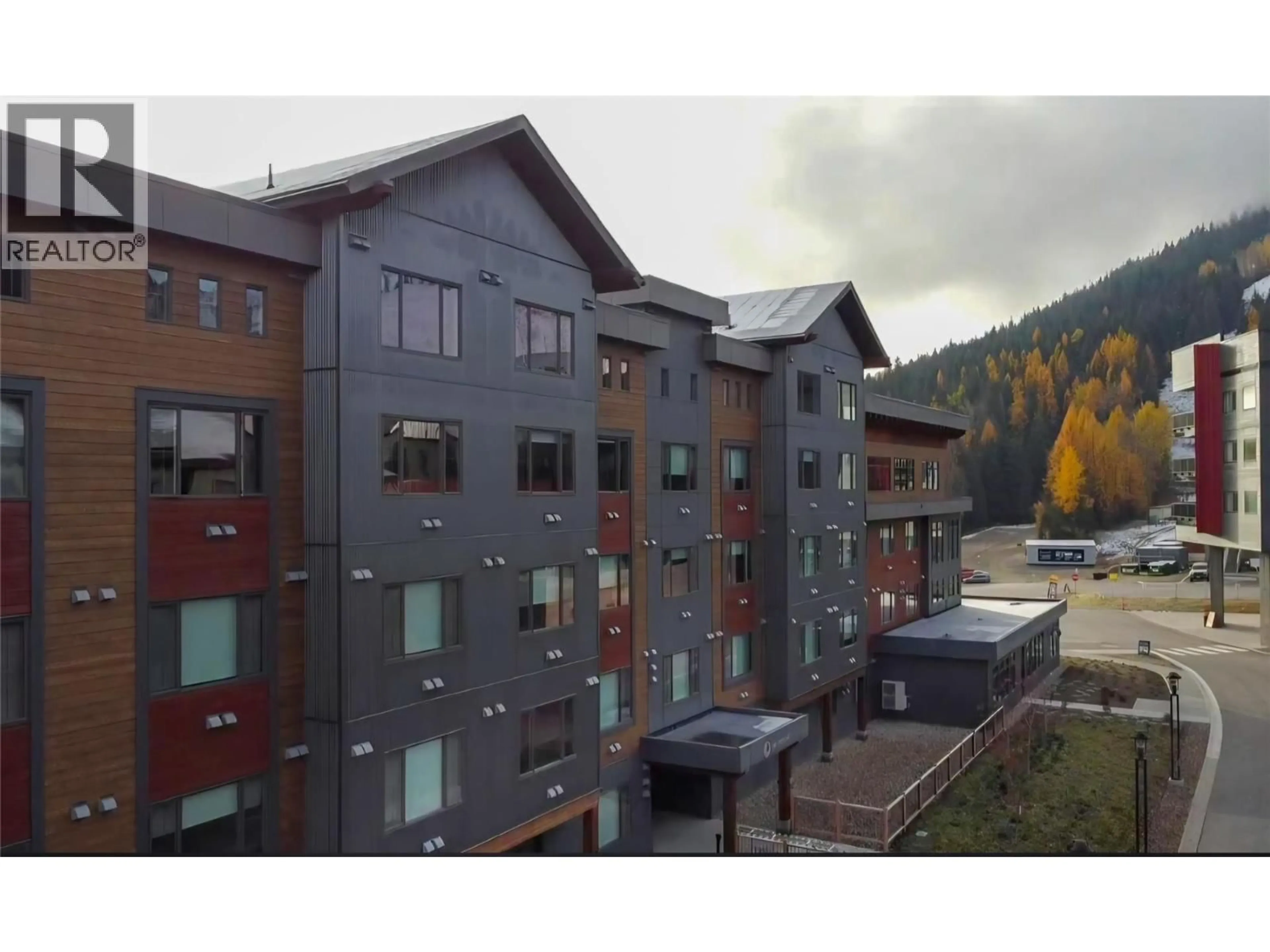 A pic from outside/outdoor area/front of a property/back of a property/a pic from drone, mountain view for 315 - 4280 RED MOUNTAIN ROAD, Rossland British Columbia V0G1Y0