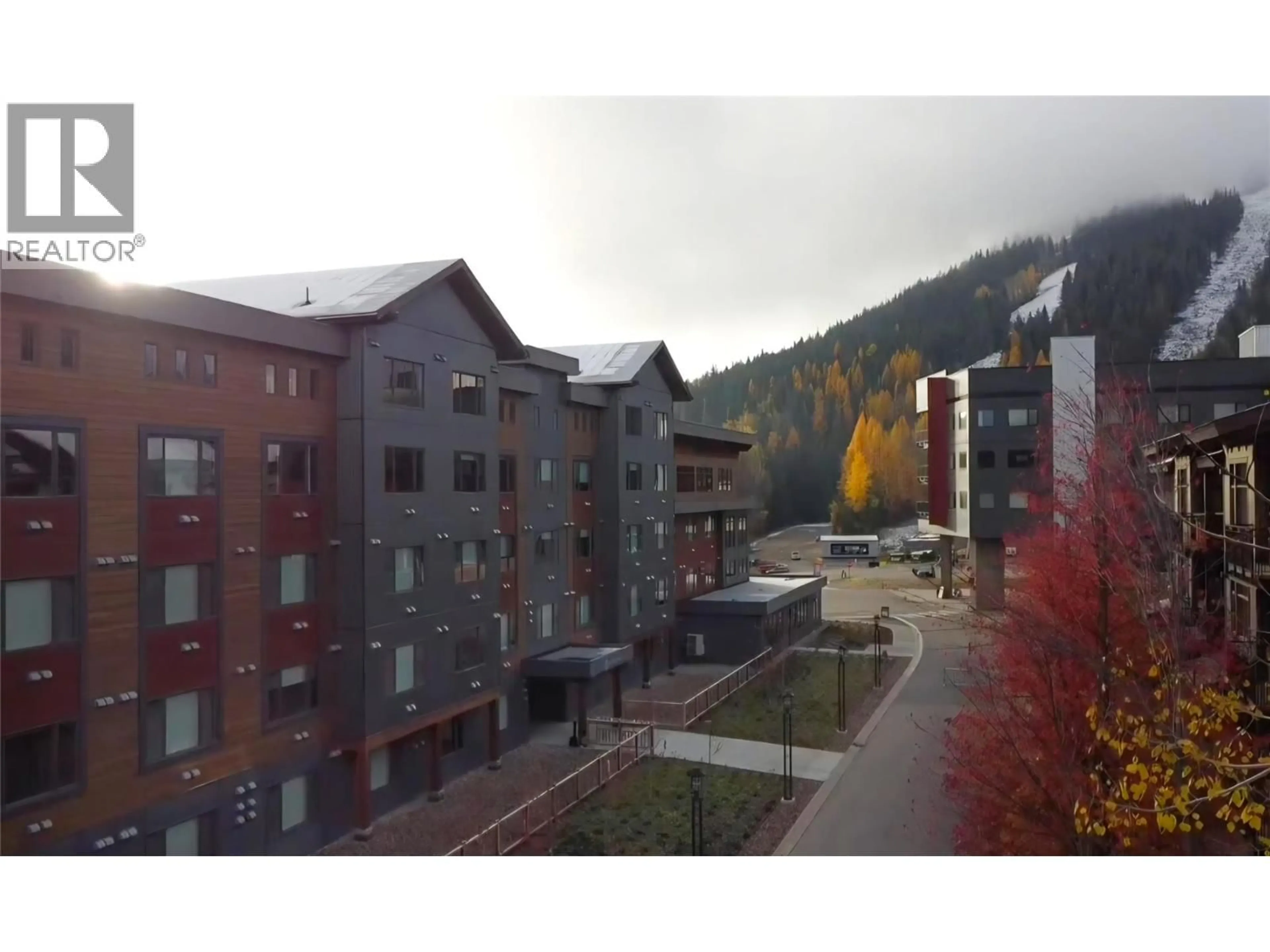 A pic from outside/outdoor area/front of a property/back of a property/a pic from drone, mountain view for 315 - 4280 RED MOUNTAIN ROAD, Rossland British Columbia V0G1Y0